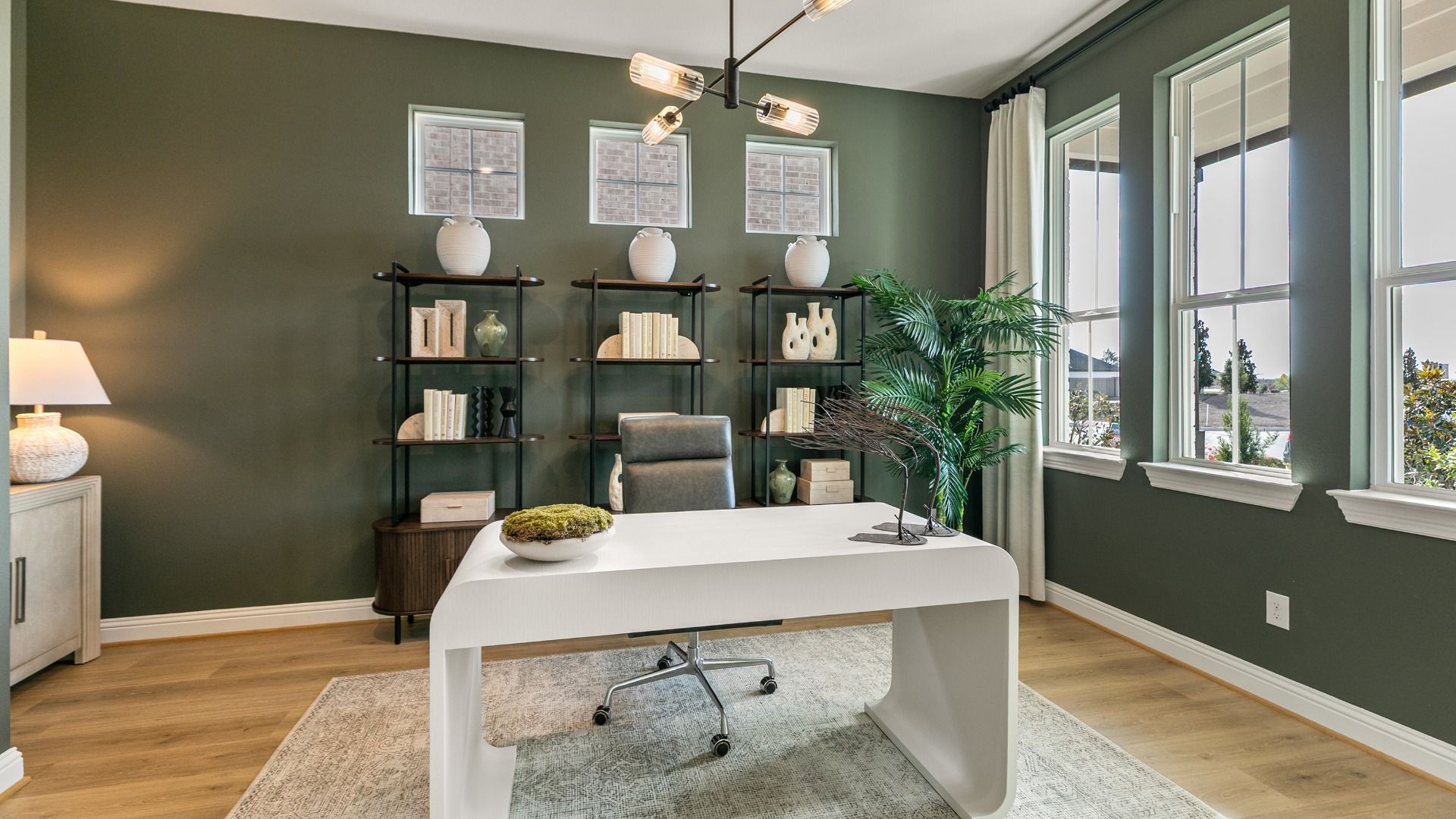Spacious designated study with large windows in this Creekhaven home is designed for work and focus.