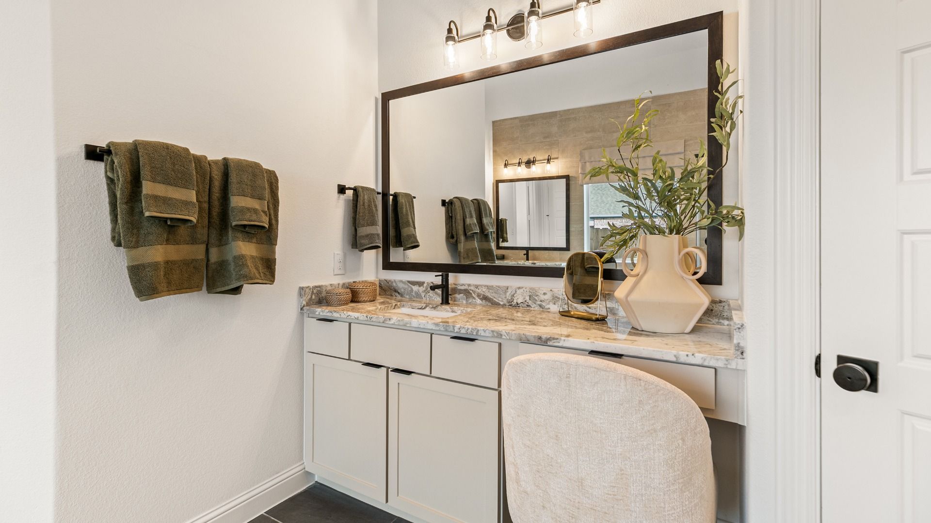 Built-in vanity area in this Creekhaven home offers added storage and daily convenience.