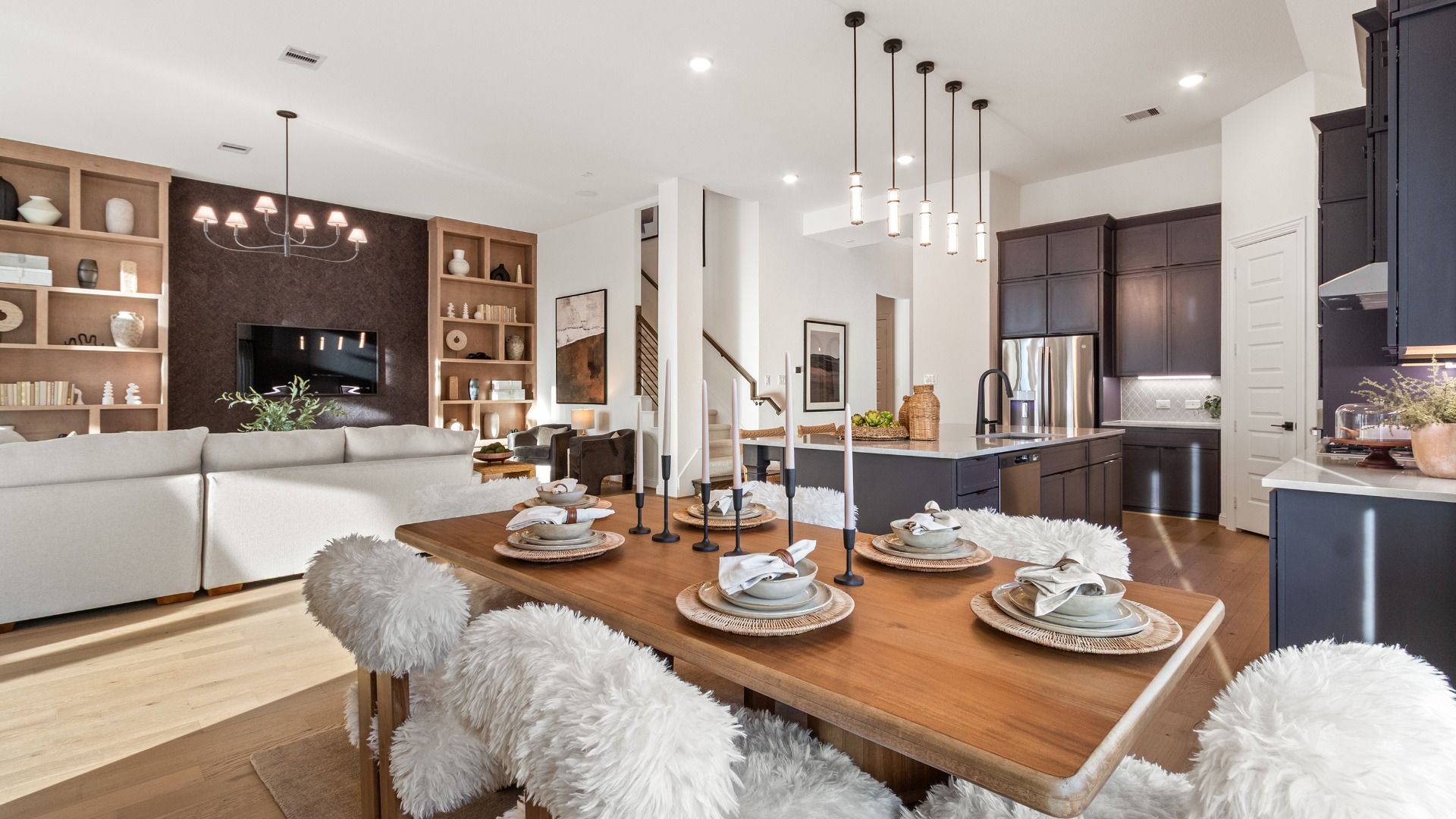 Seamless flow between kitchen, dining area, and great room, creating the perfect setting for entertaining in Sundance Cove.