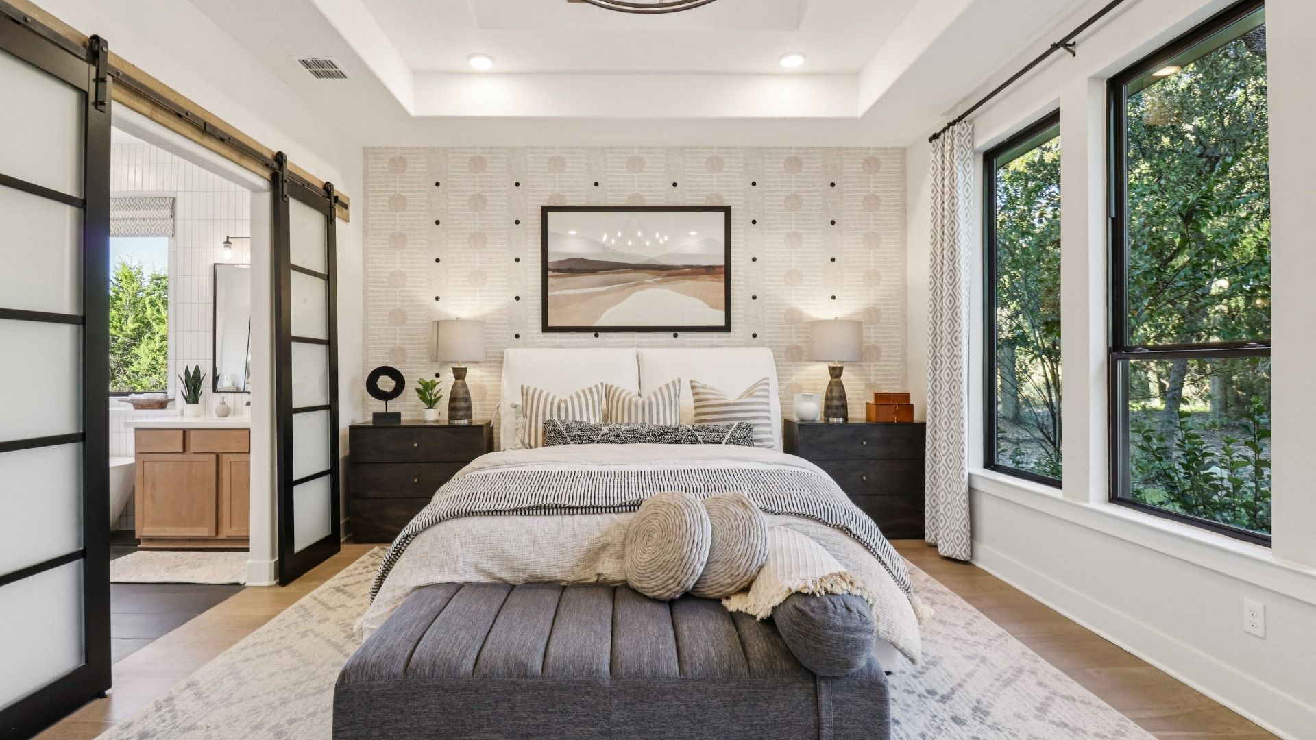 Tray ceiling with exposed beams enhances this stylish San Antonio retreat at Verandas at the Rim.