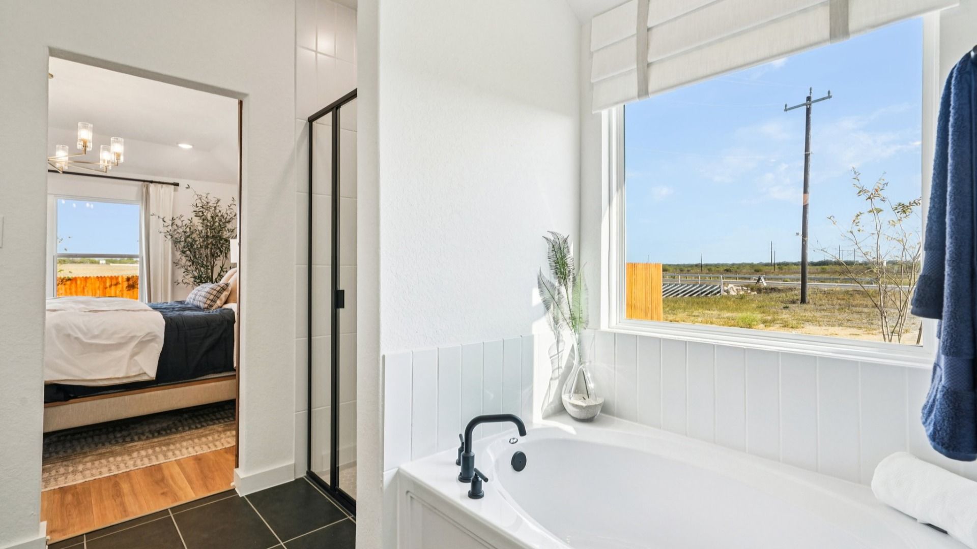 Owner's Bath features separate tub and shower.