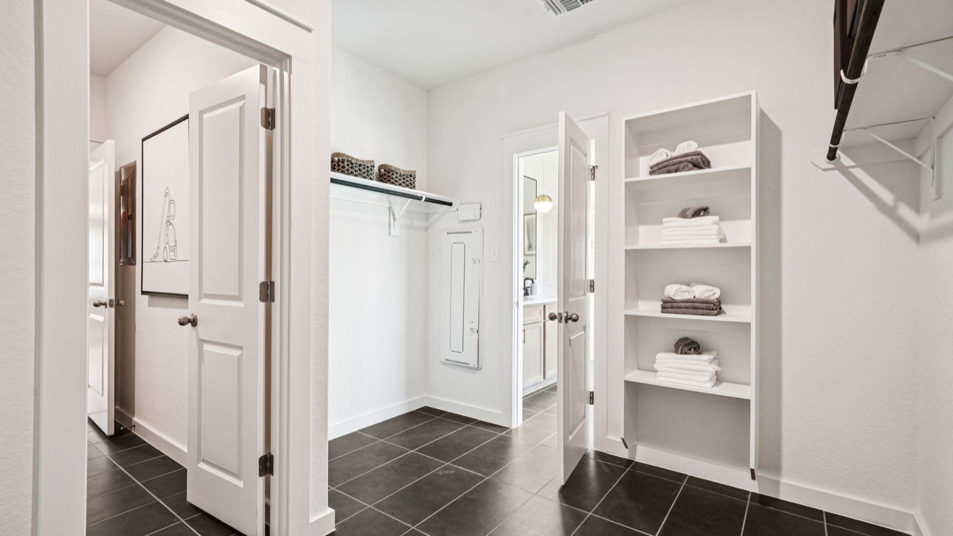 Owner's Closet with Door to Laundry