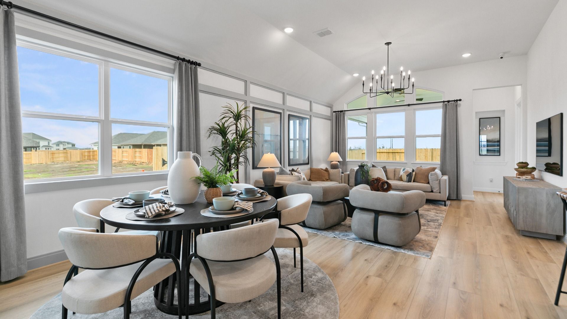Inviting dining area in this Aldeana home with natural light and modern finishes.