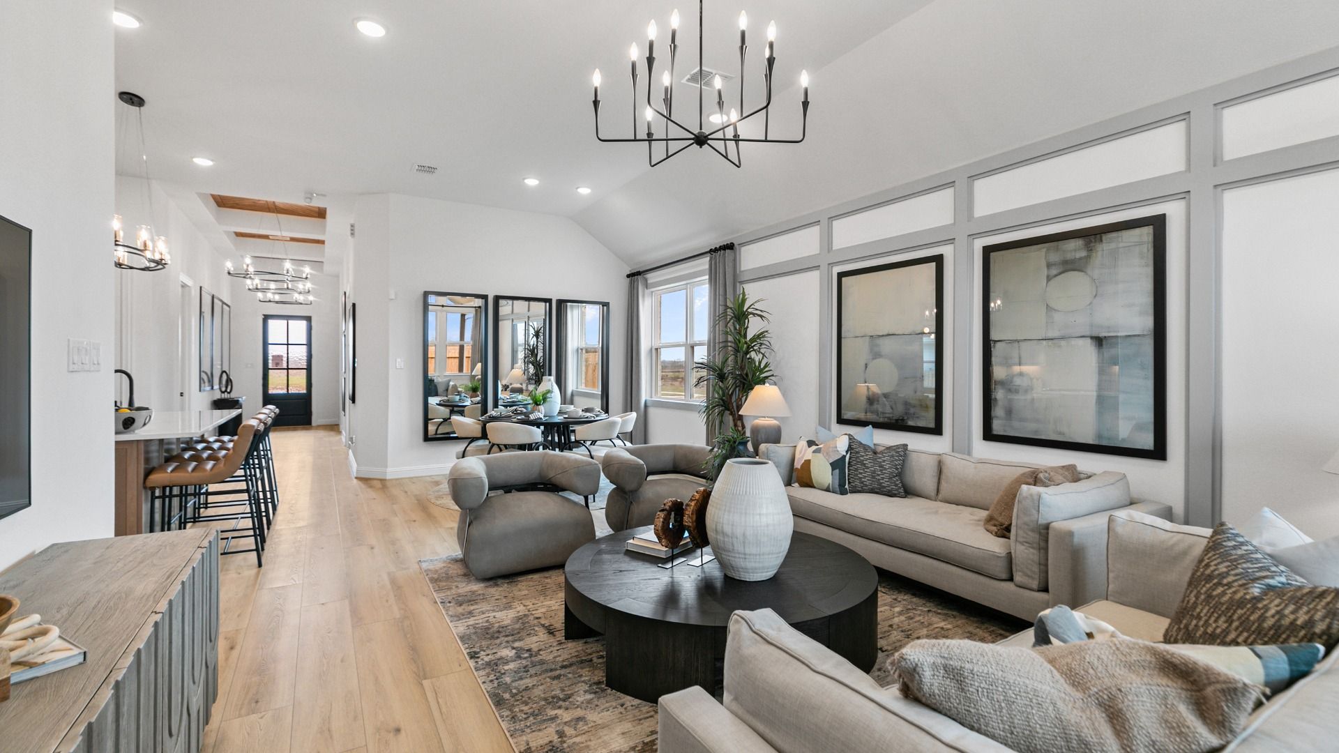 Modern living room in Aldeana showcases open concept design and stylish finishes