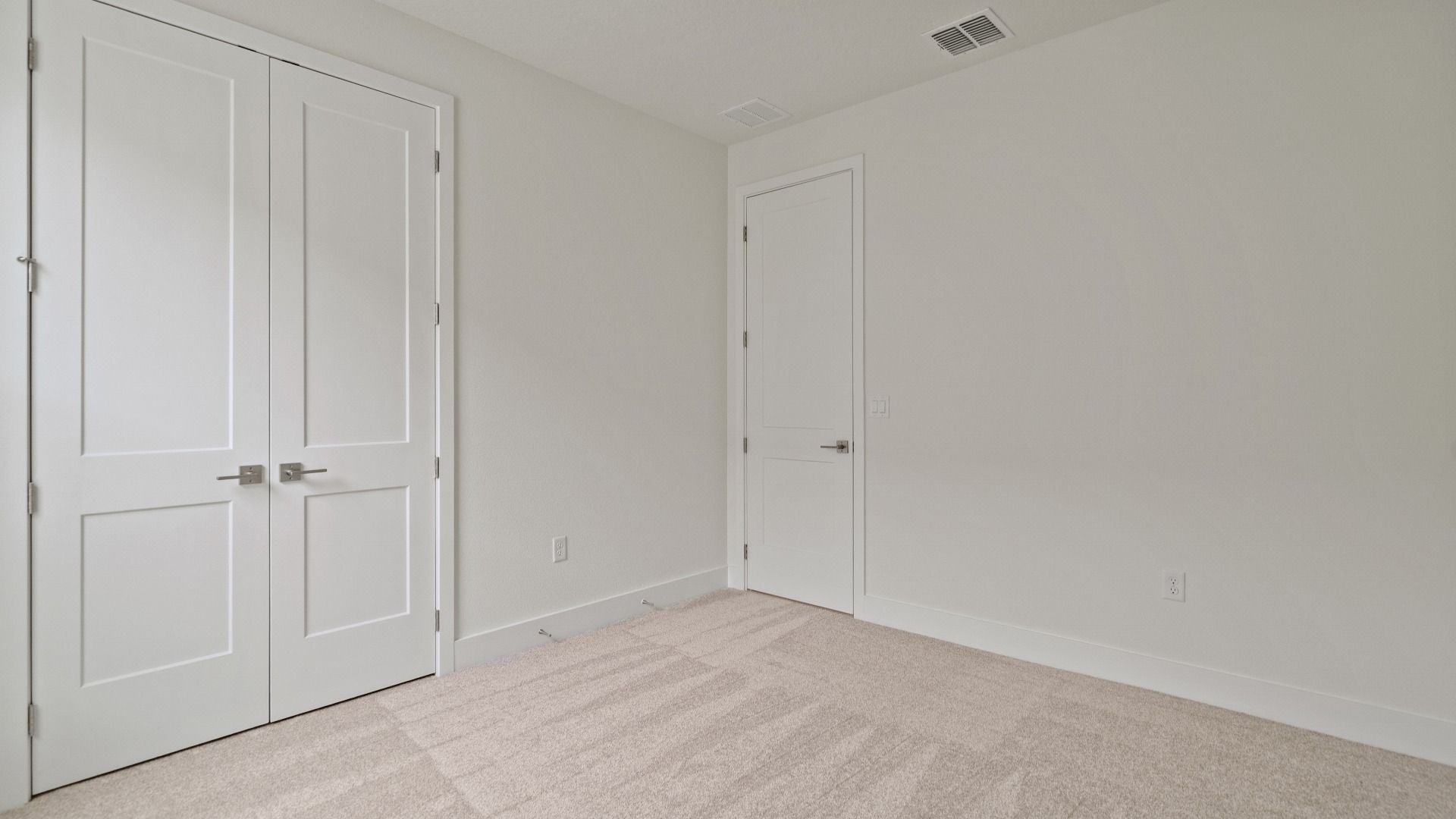 Bedroom in the Buttonwood floorplan by DRB Homes at Lakeside at Satilla in Saint Cloud, FL