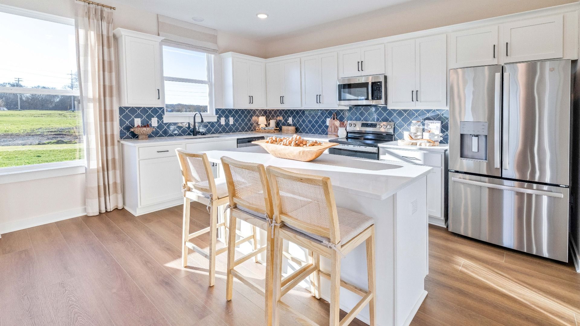Efficient kitchen layout with plenty of prep space as well as storage