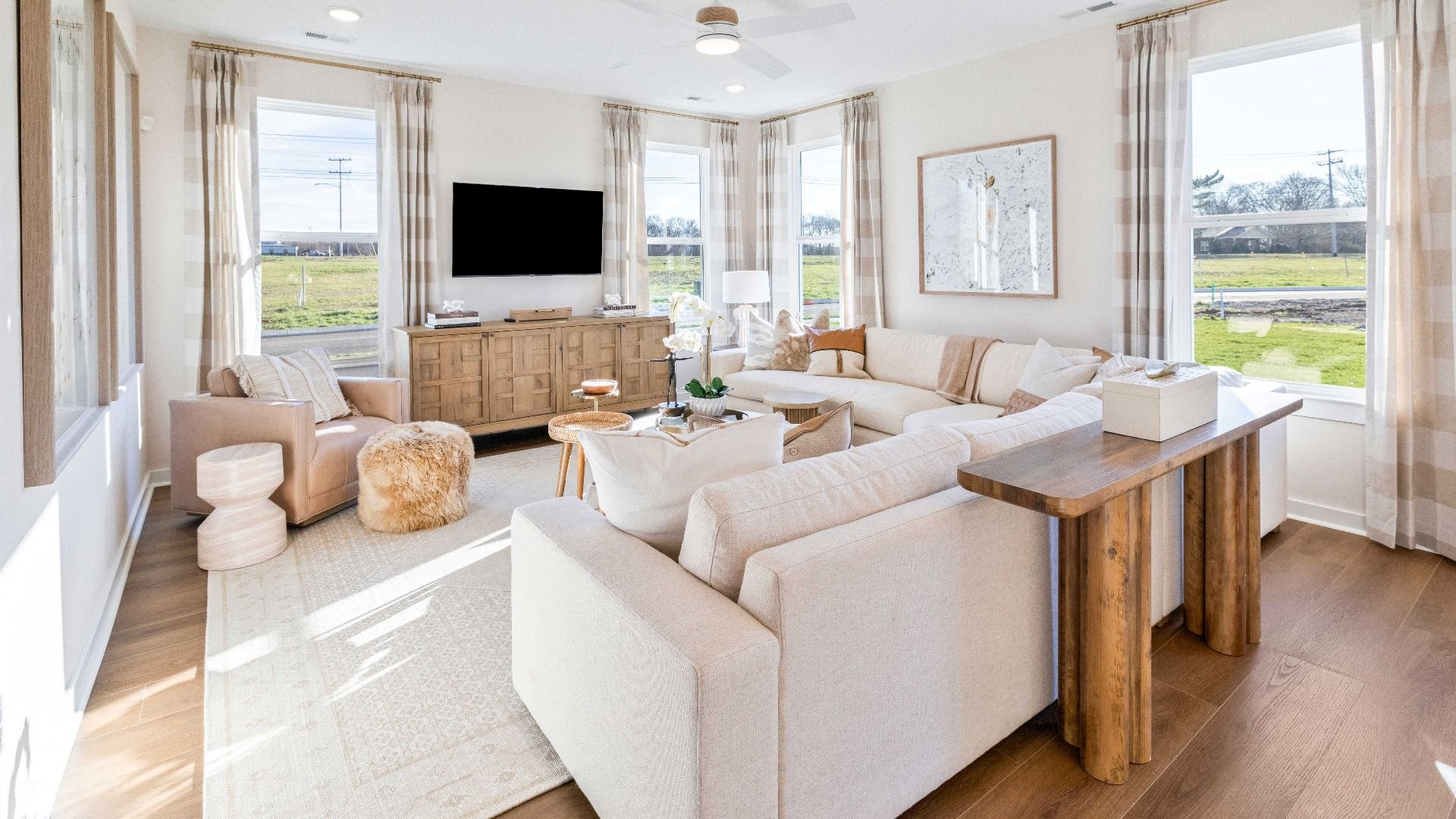 Cozy and well-lit living room for family gatherings and relaxing