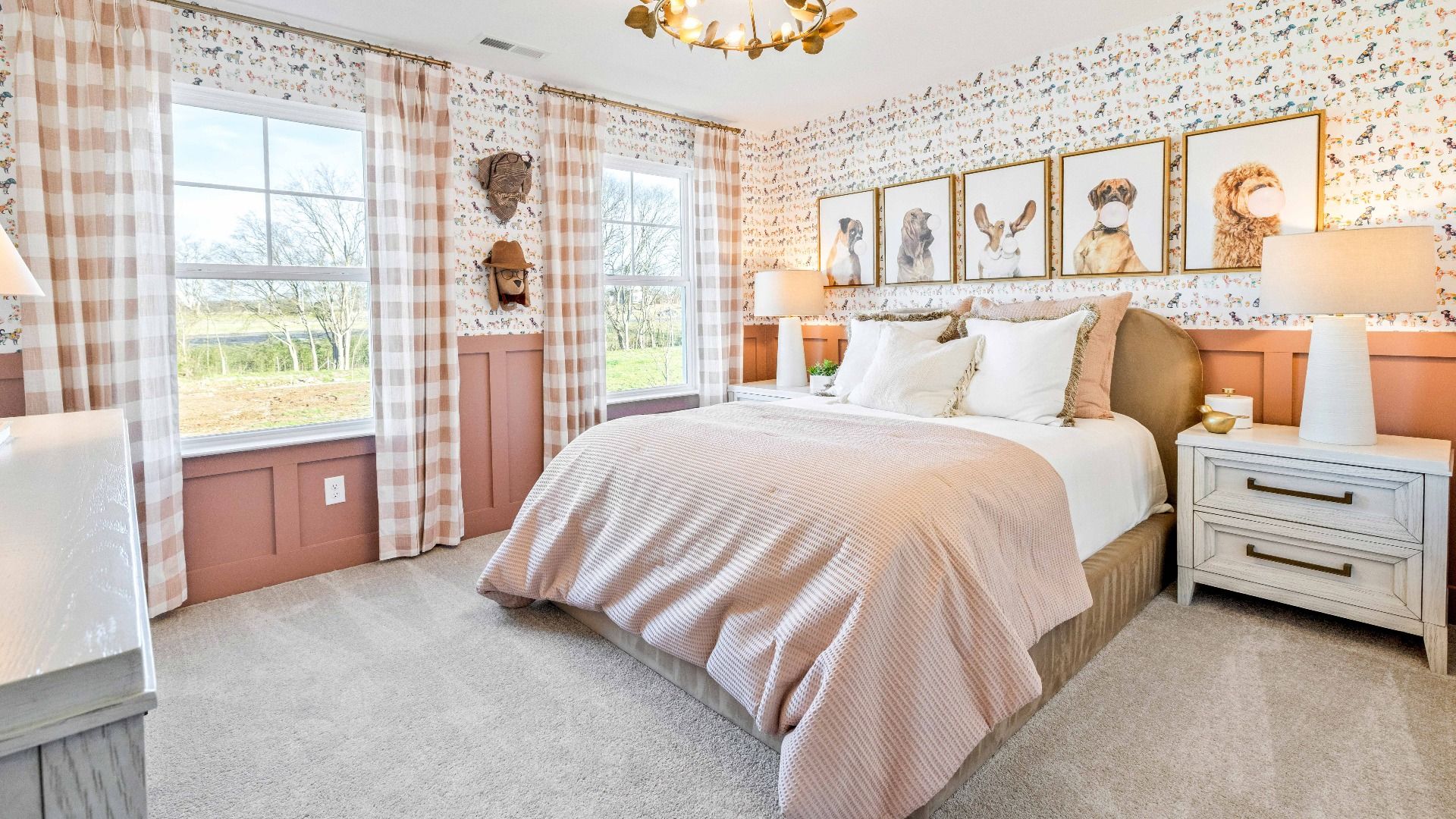 Secondary bedroom with multiple windows and nearby closet