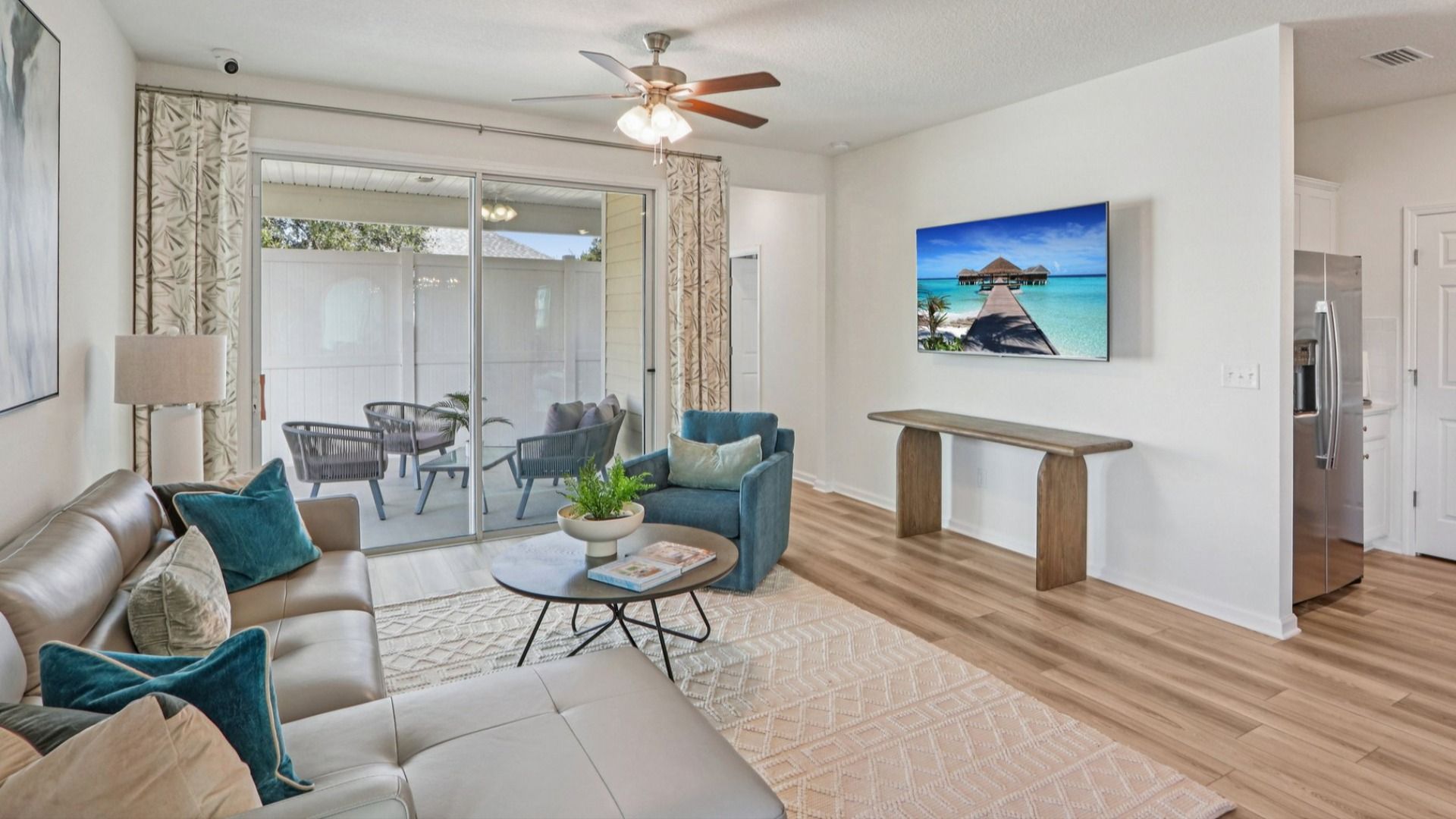 Elegant grey sectional and artful touches create a modern, upscale haven in Panther Creek.