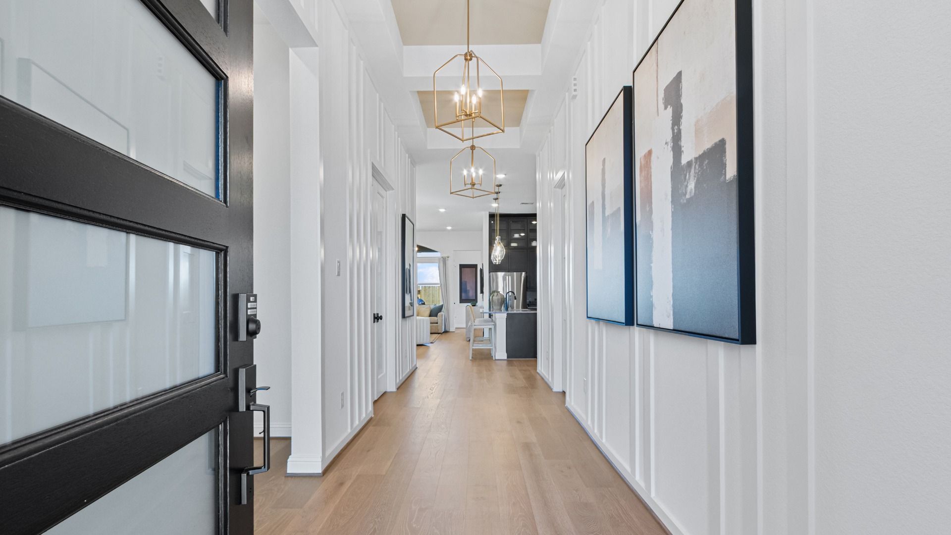 Elegant Front Entryway with High Ceilings in Wildrye By DRB Homes