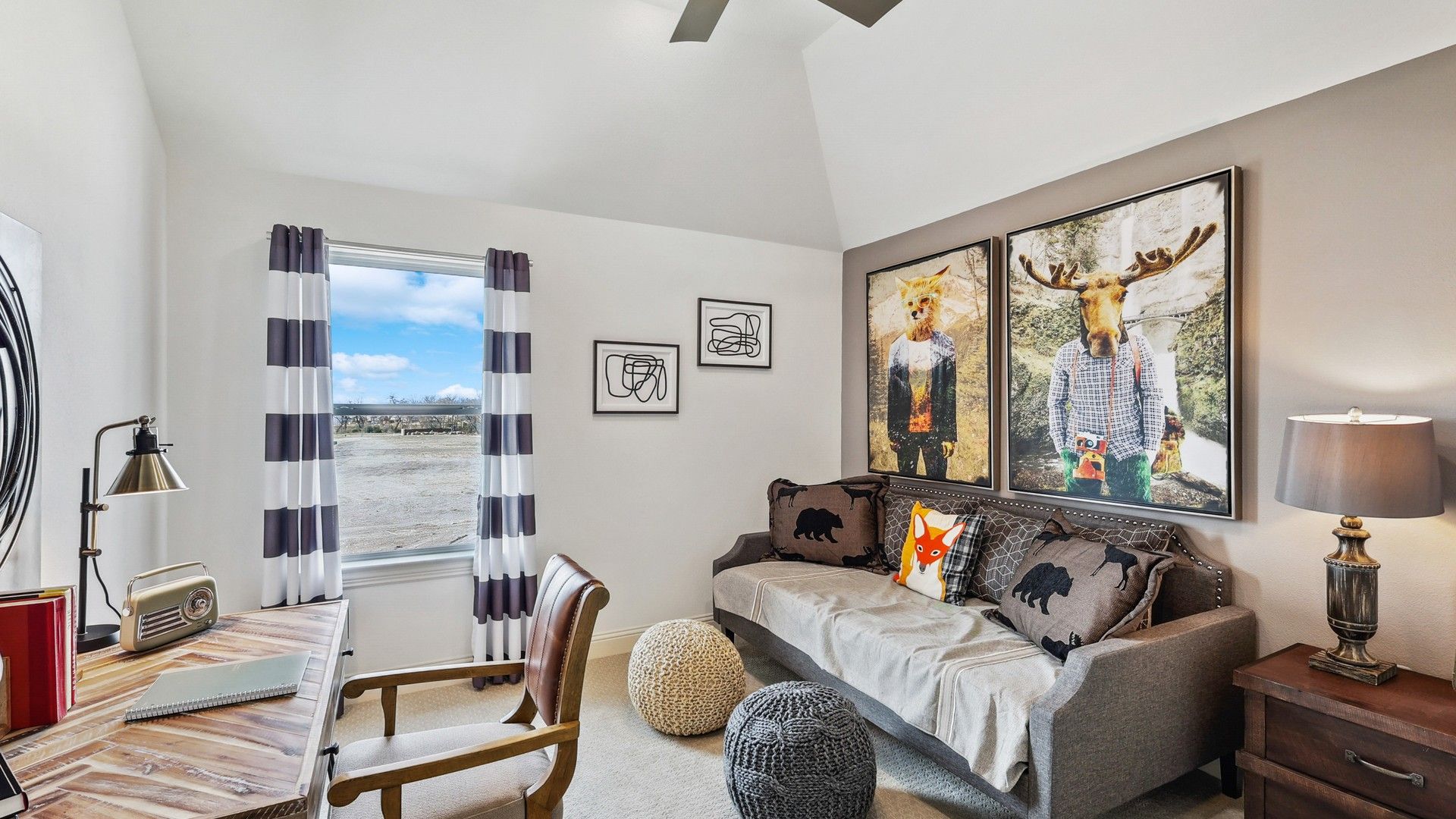 Experience refined elegance with bespoke furnishings and vibrant art in a Solterra Texas study.