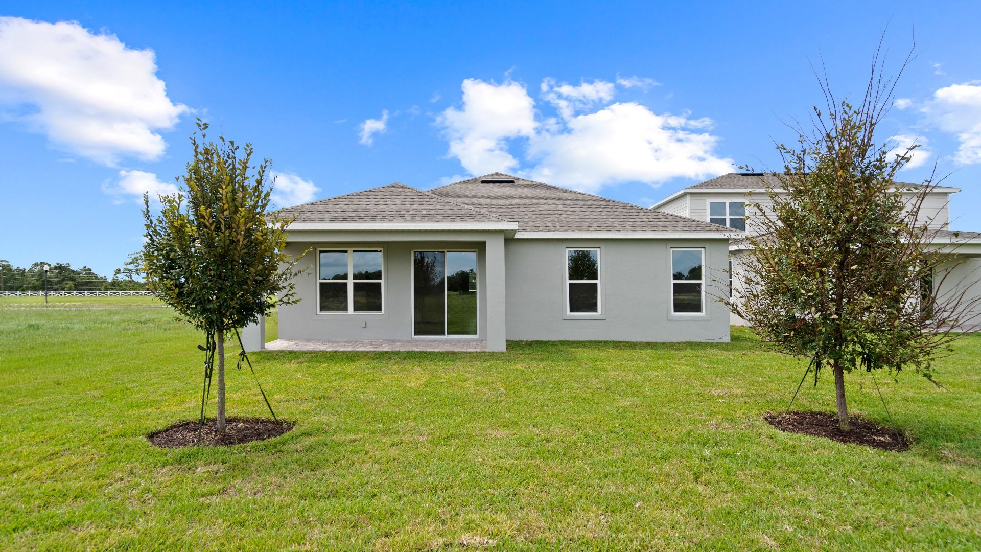 New Home in Saint Cloud, FL Longleaf Floor plan Rear Exterior by DRB Homes in Lakeside at Satilla