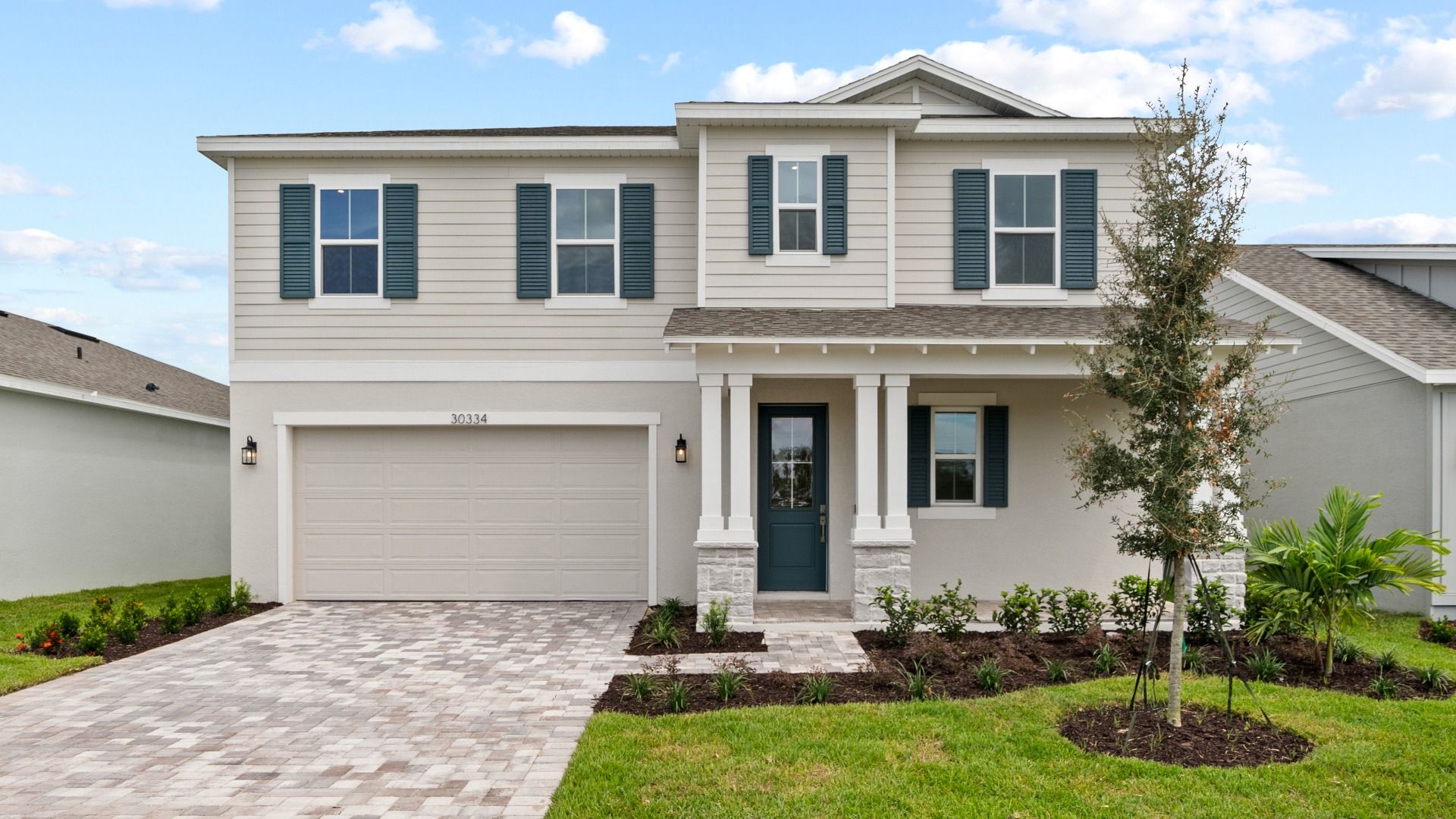 Mangrove Front Exterior by DRB Homes, New Homes in Saint Cloud, FL at Lakeside at Satilla