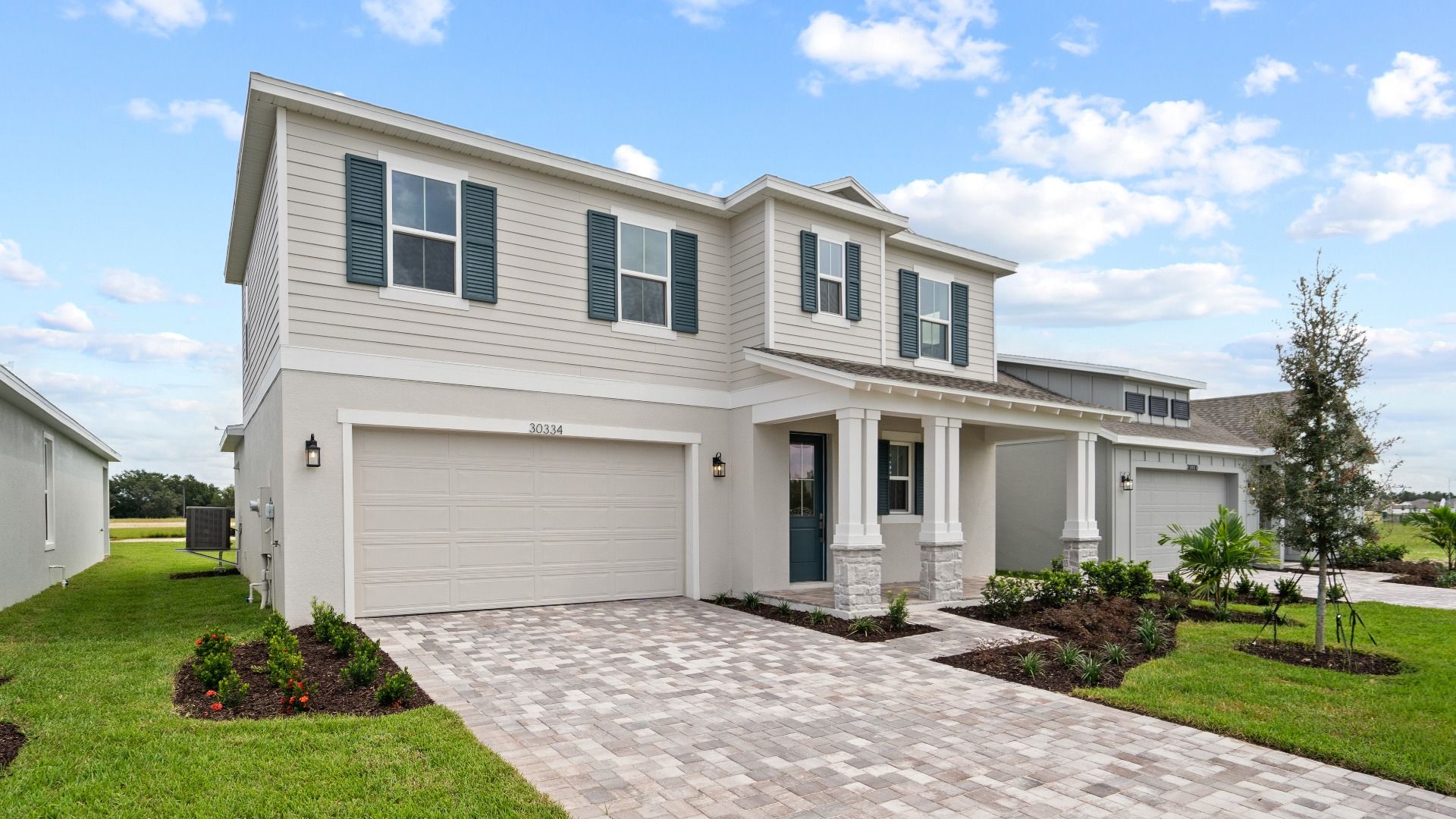 Mangrove Front Exterior by DRB Homes, New Homes in Saint Cloud, FL at Lakeside at Satilla