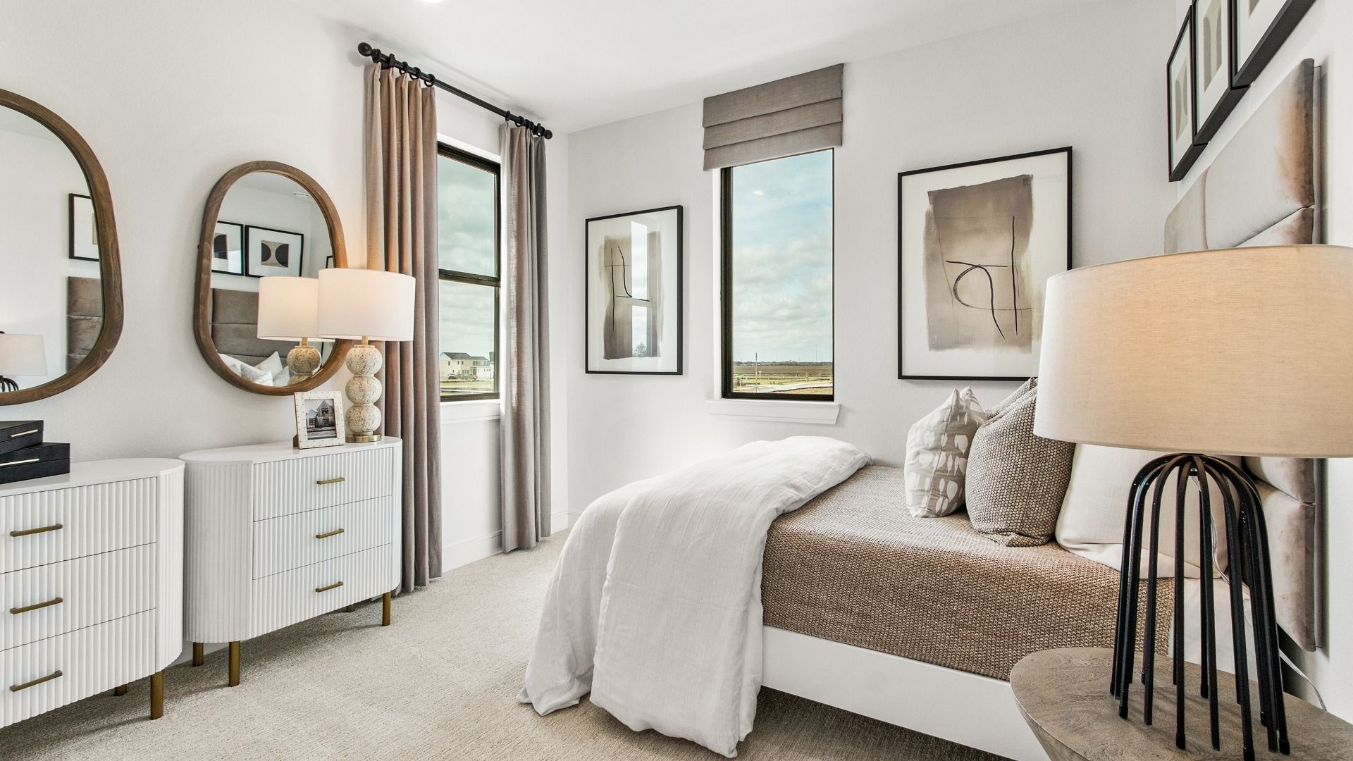 This guest bedroom in Bridgeland Central features a bright, modern and relaxing design.