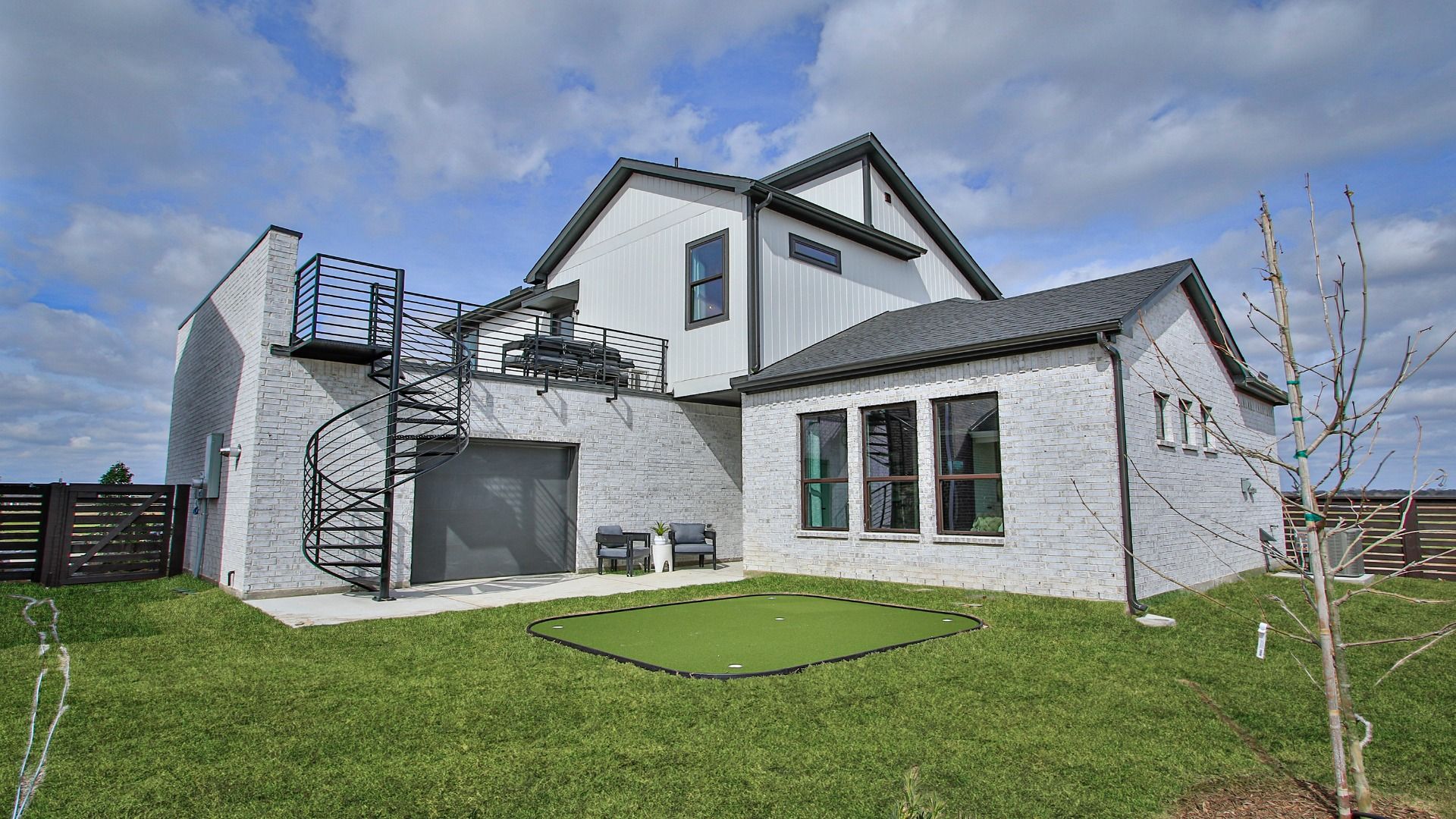 Spiral staircase creates a unique architectural feature on this home in Bridgeland Central.