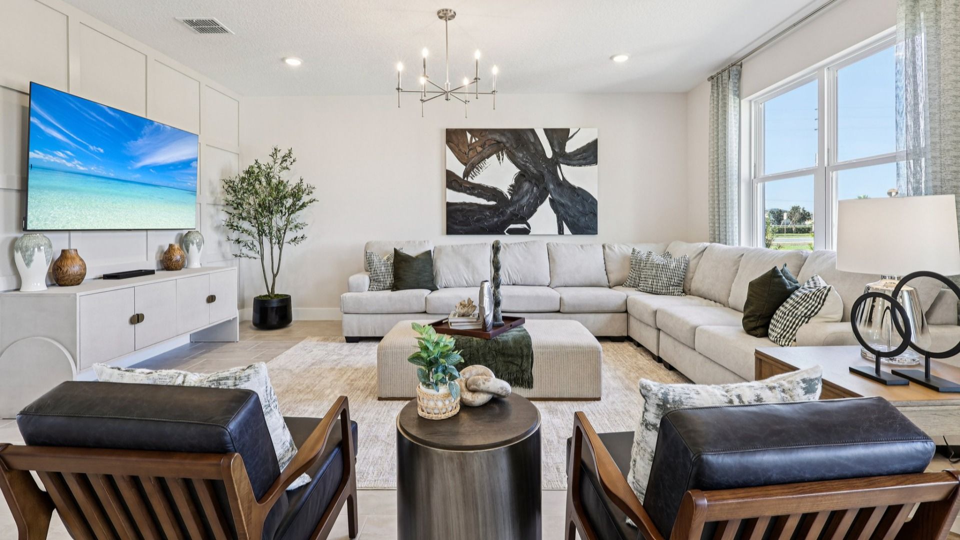 The Mangrove Model Living Area at Lakeside at Satilla by DRB Homes in Saint Cloud, FL