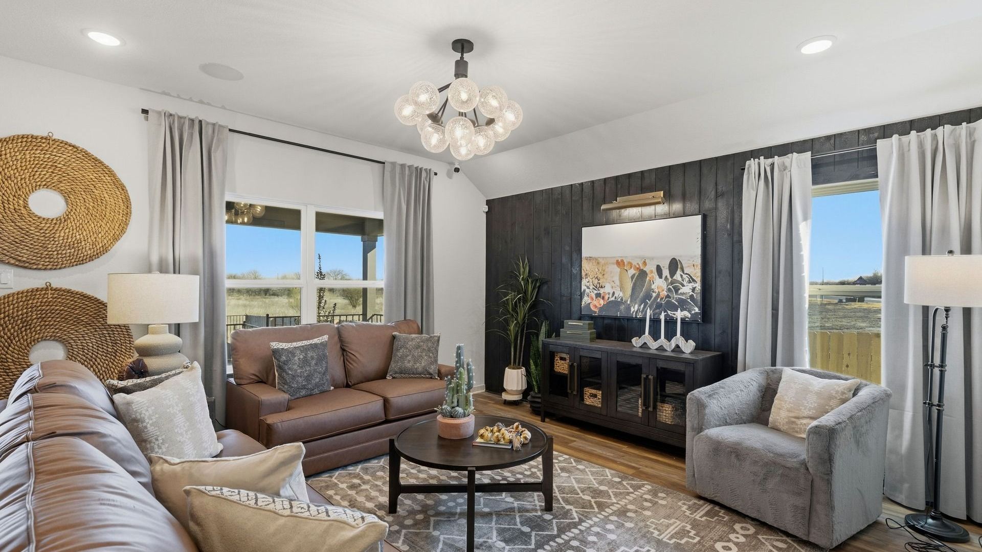 Experience elegance with this Infinity Square home featuring exquisite brickwork and a gabled roof.