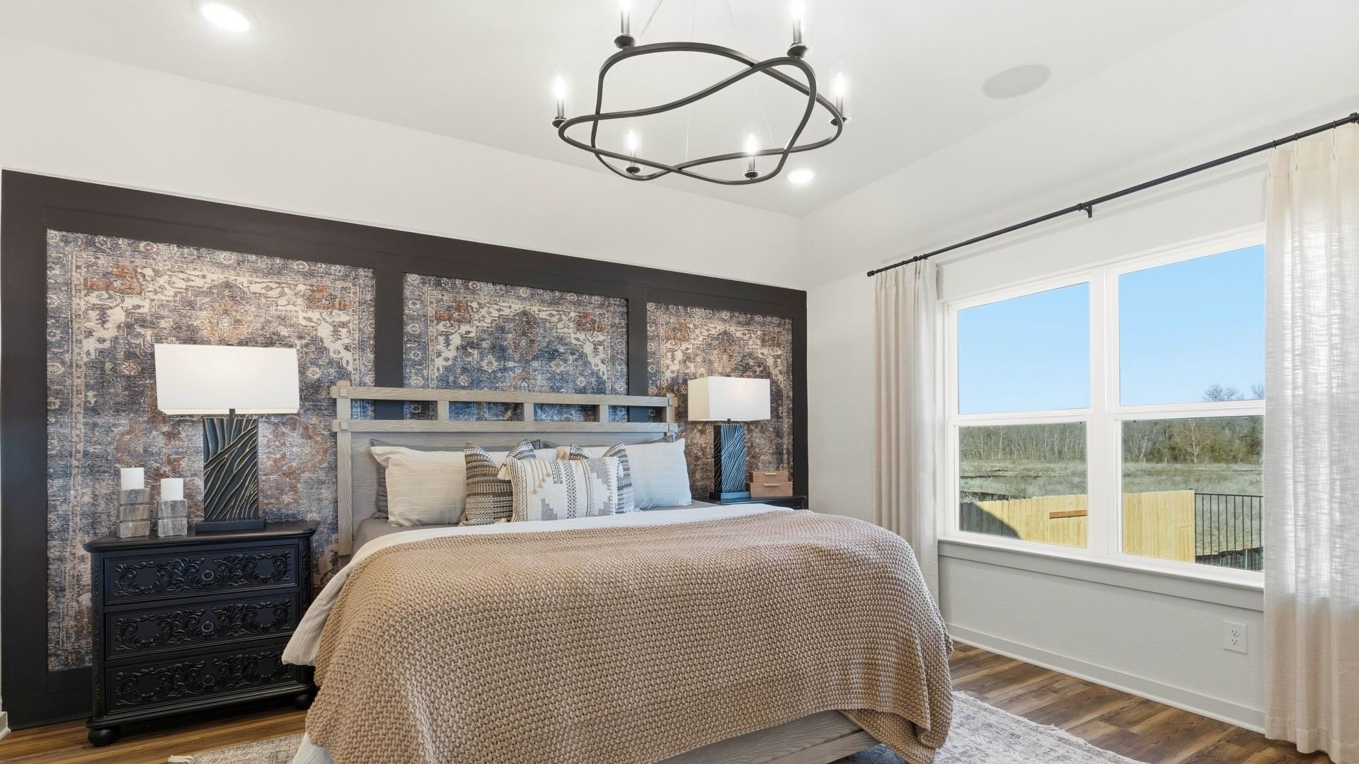 Experience elegance with this Infinity Square home featuring exquisite brickwork and a gabled roof.