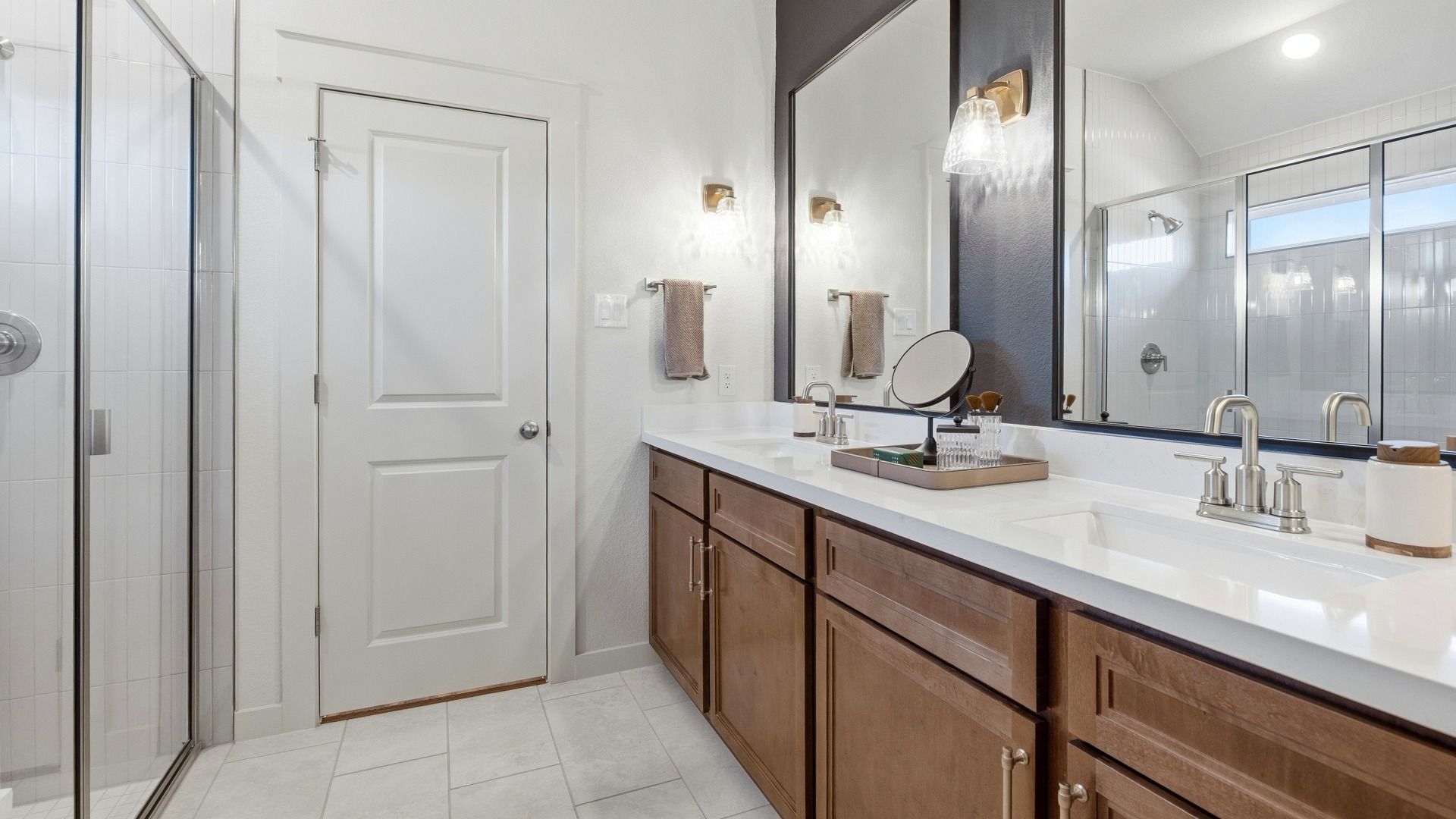 Experience elegance with this Infinity Square home featuring exquisite brickwork and a gabled roof.
