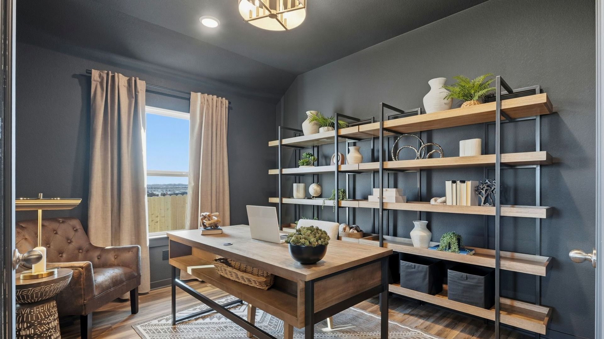 Experience elegance with this Infinity Square home featuring exquisite brickwork and a gabled roof.