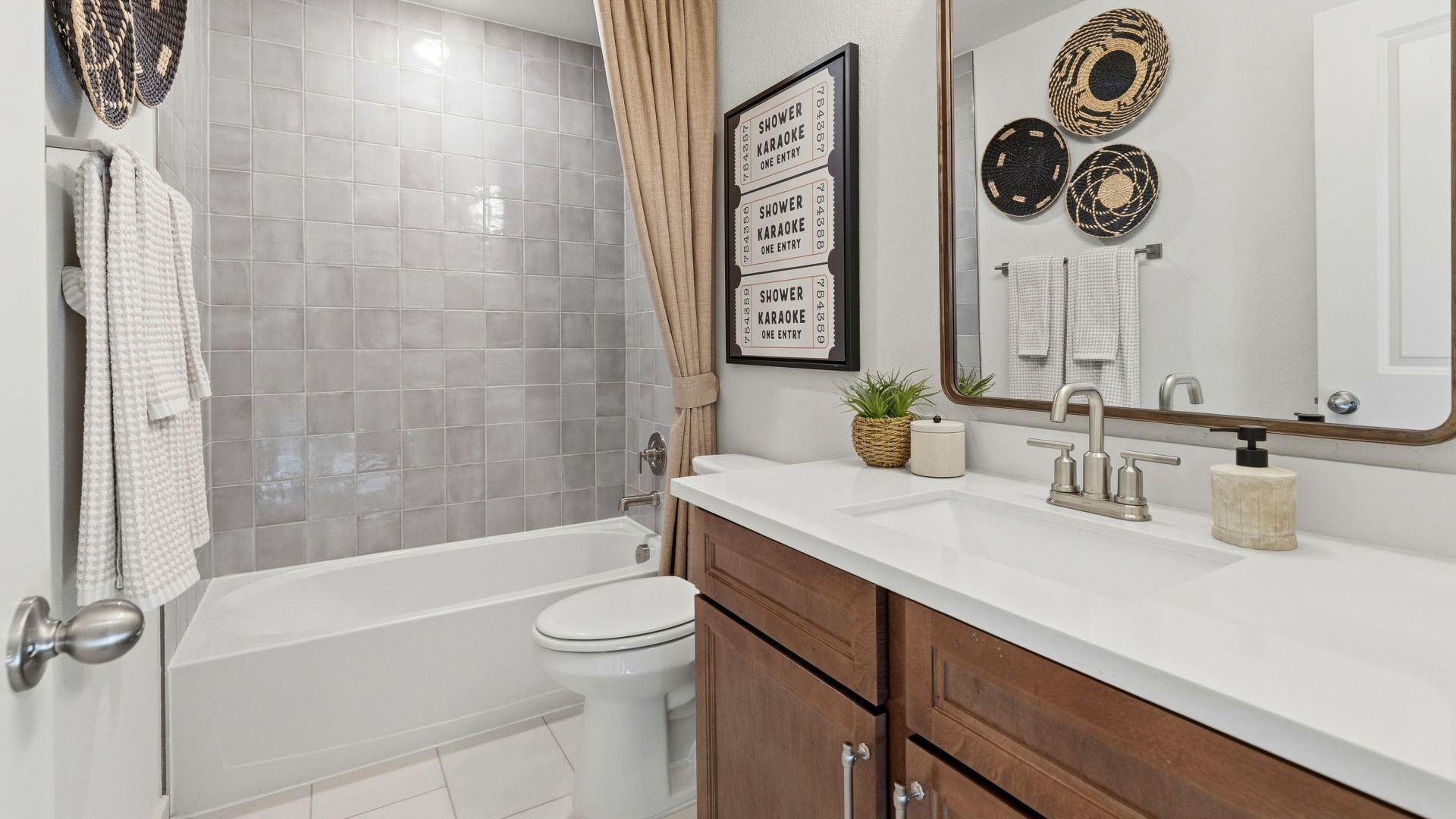 Experience elegance with this Infinity Square home featuring exquisite brickwork and a gabled roof.