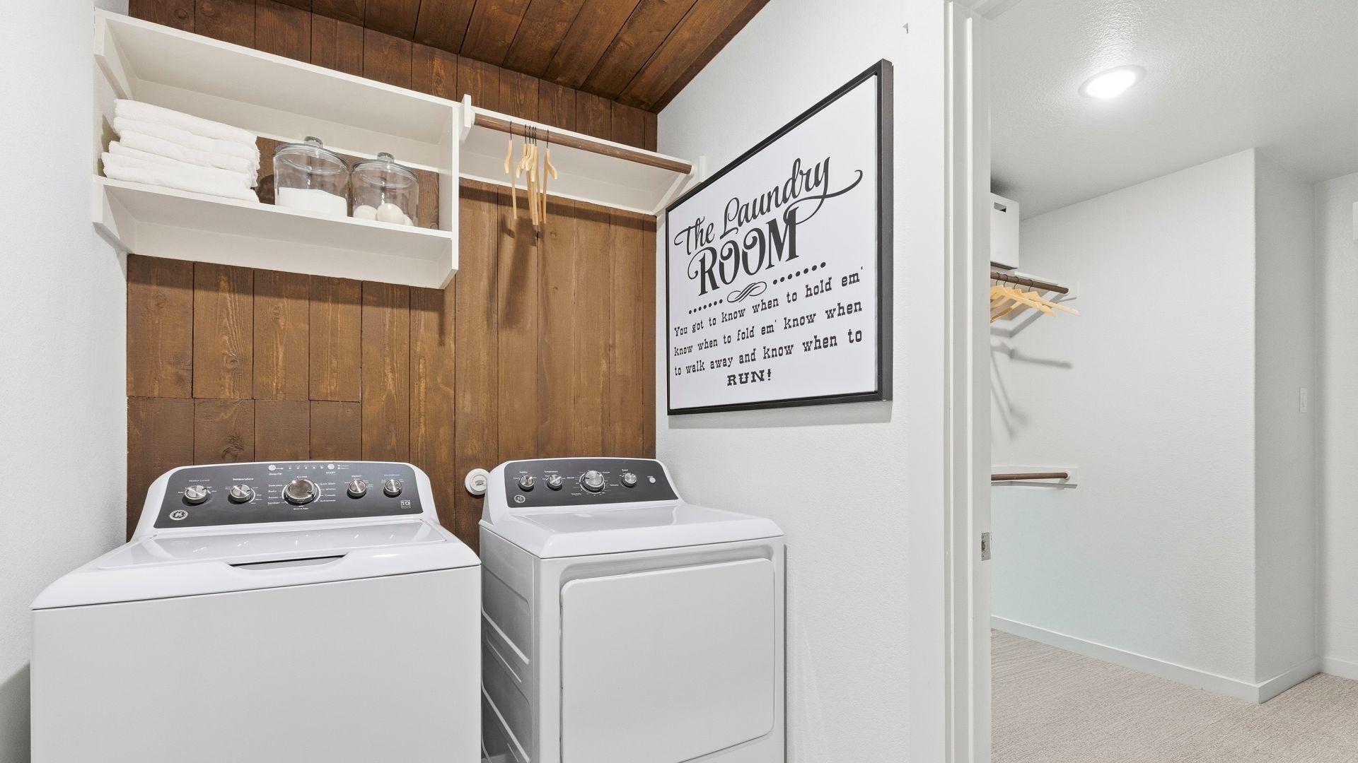 Experience elegance with this Infinity Square home featuring exquisite brickwork and a gabled roof.