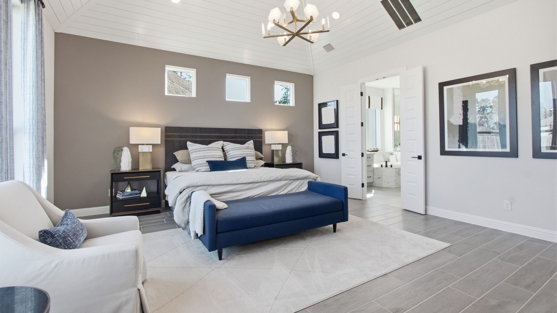 Experience opulence with vaulted ceilings and refined finishes in Mostyn Manor Reserve's exquisite bedroom.