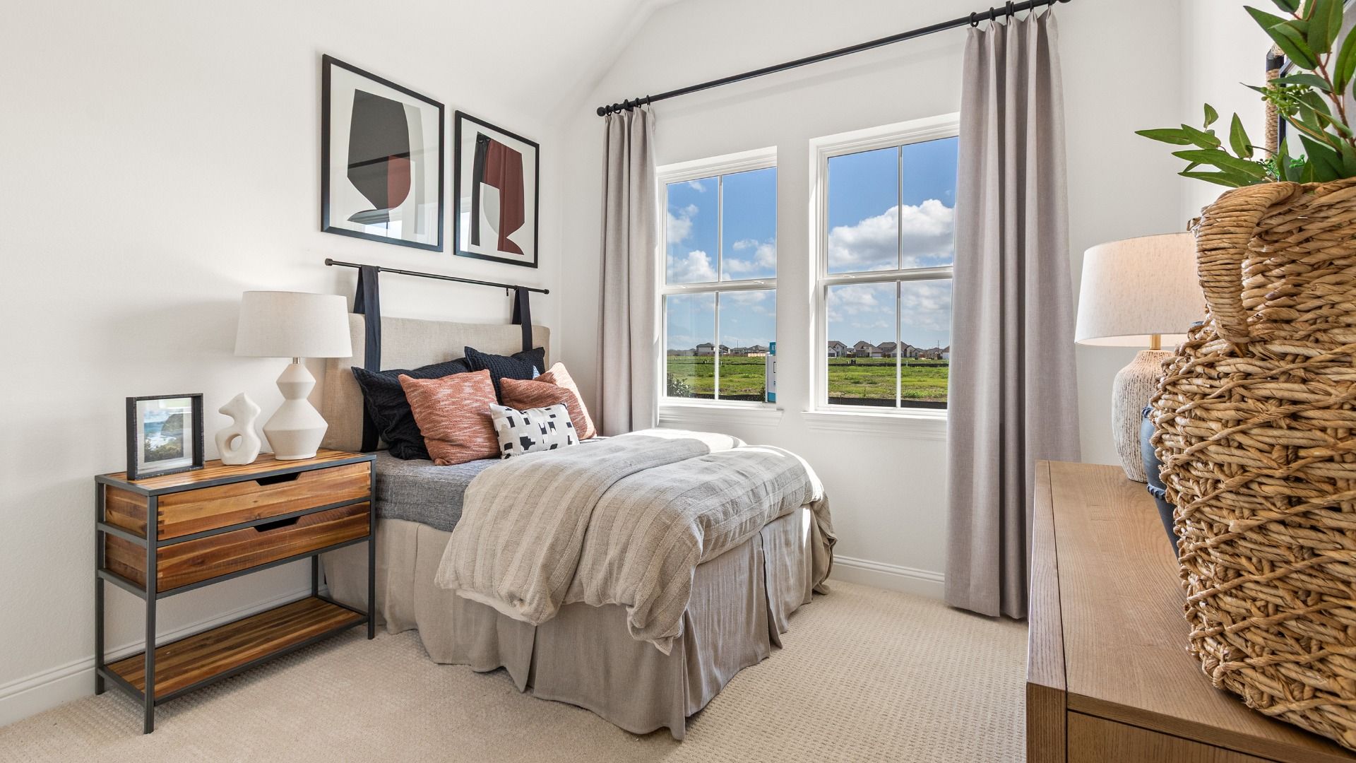 Luxurious River Ranch bedroom features high ceilings and a minimalist design, offering elegance.