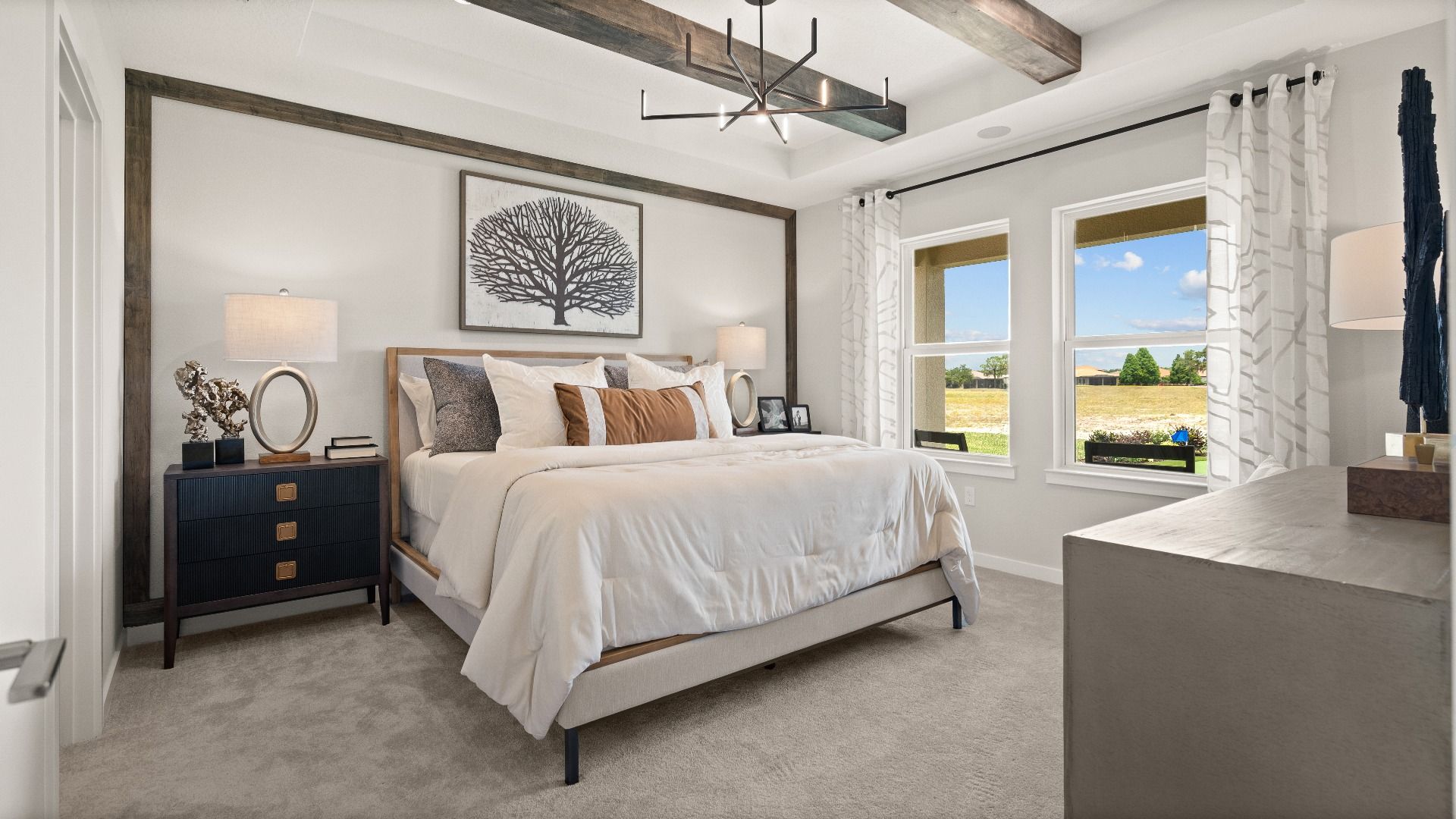 Contemporary Primary Suite with in this New Construction Home in Winter Haven Florida by DRB Homes in Willowbrook North