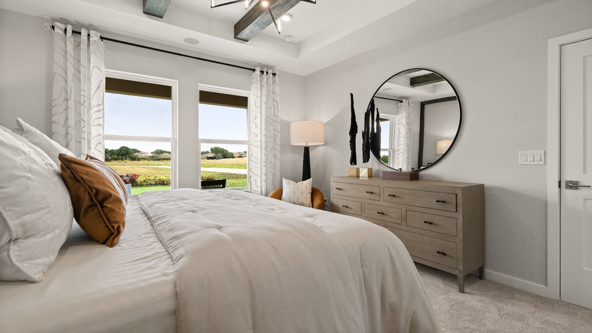 Contemporary Primary Suite with in this New Construction Home in Winter Haven Florida by DRB Homes in Willowbrook North