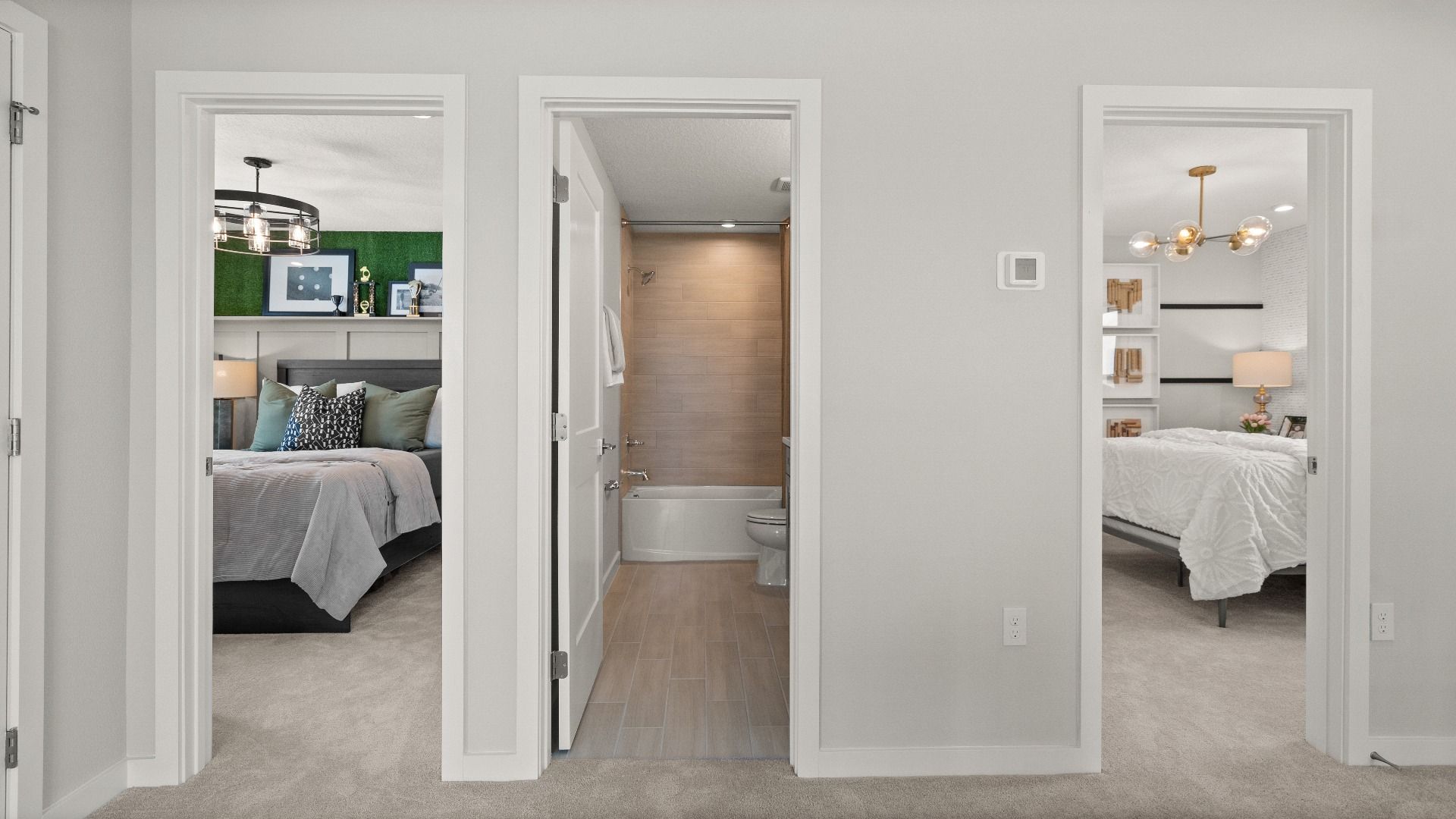 Second floor - two bedrooms and shared bath in this New Construction Home in Winter Haven by DRB Homes in Willowbrook North