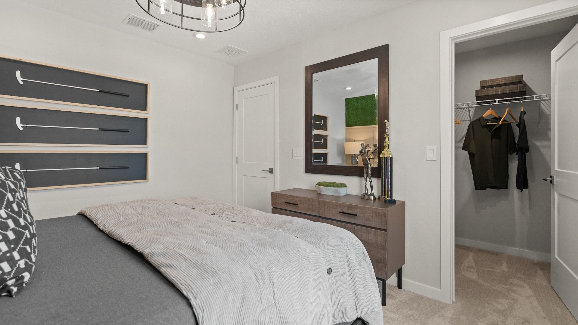 Golf themed bedroom overlooking the course New Construction Home in Winter Haven by DRB Homes in Willowbrook North