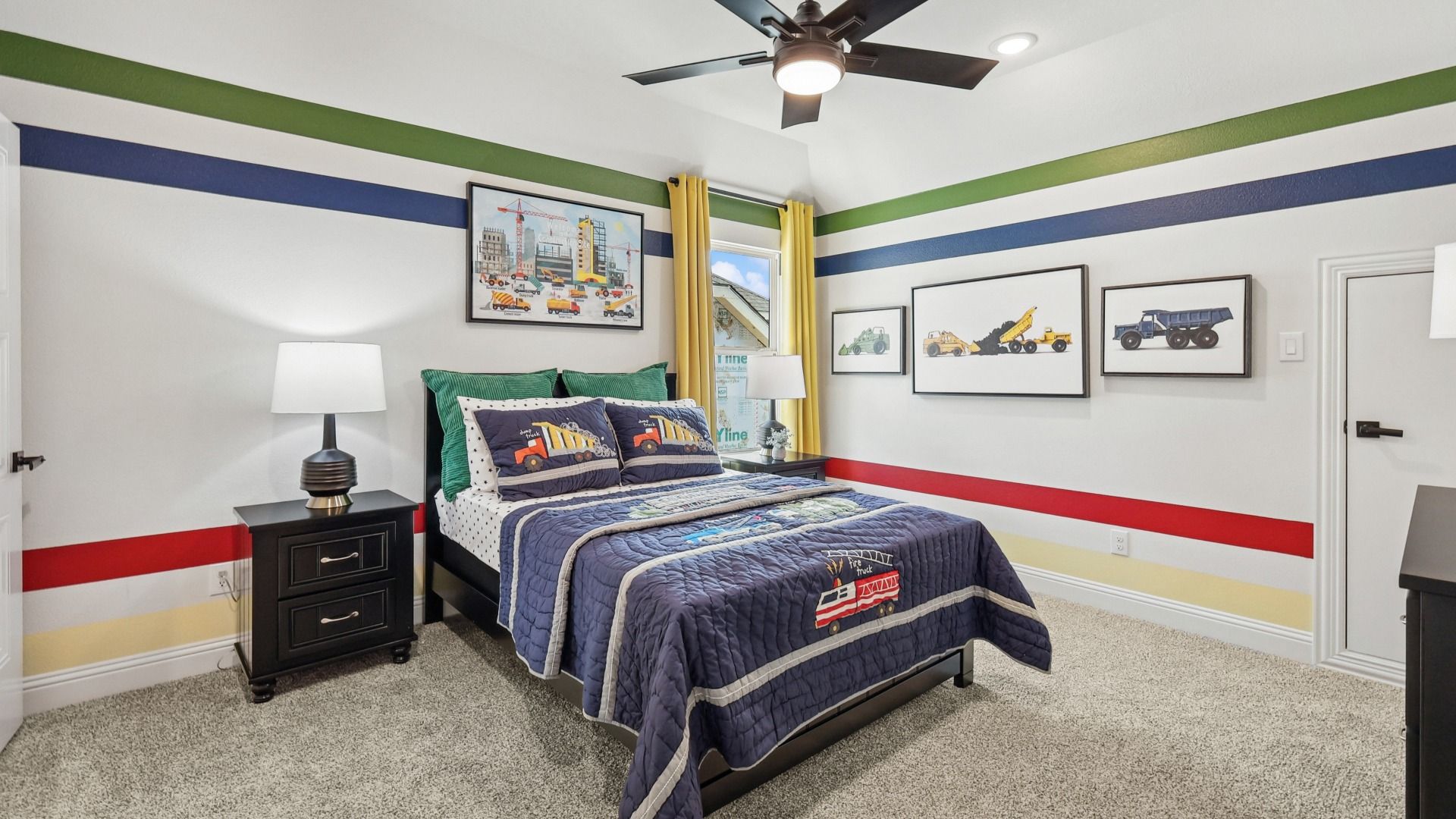 Elegant kid's room with bold stripes and custom construction-themed accents in Green Meadows.