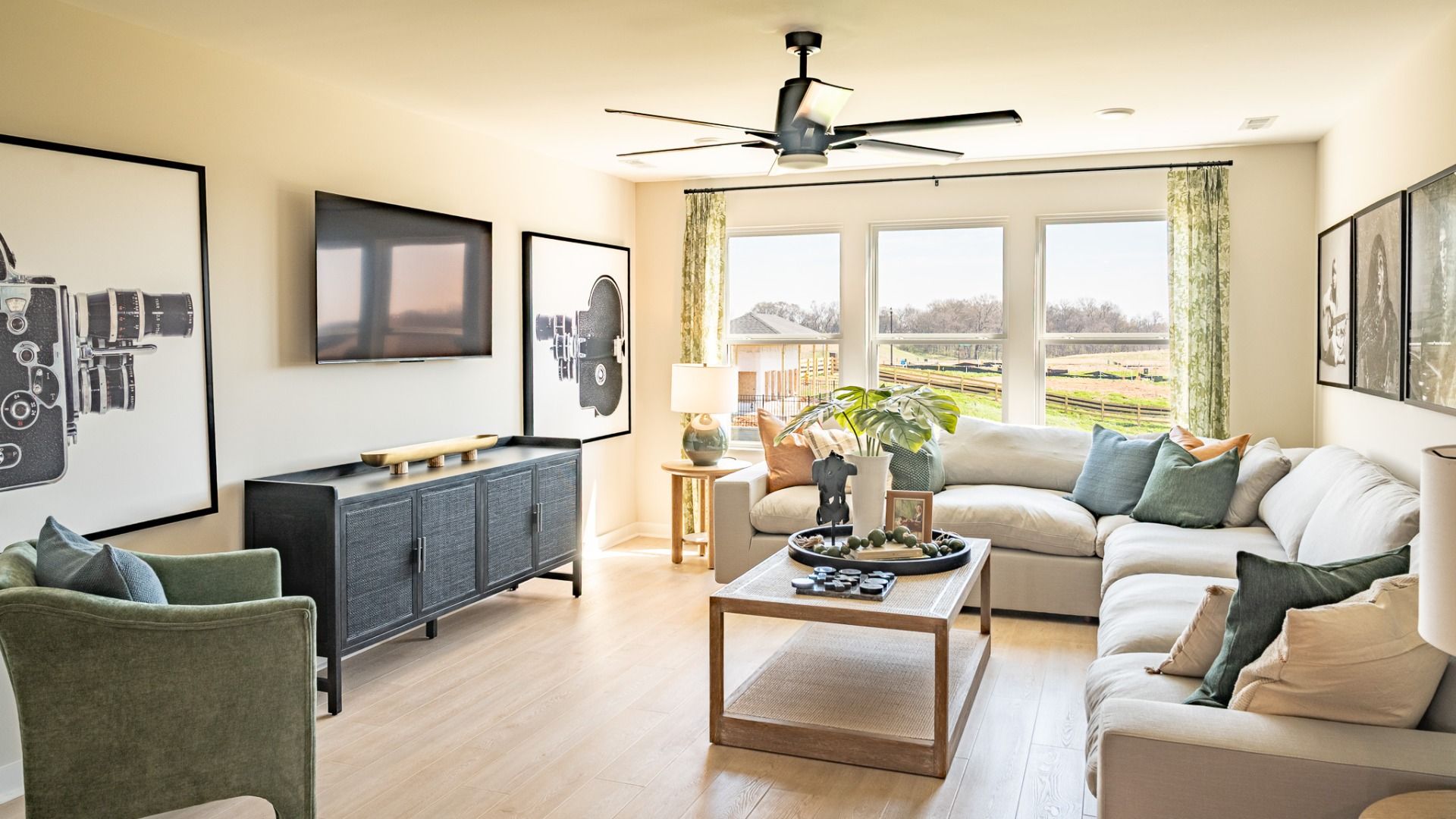 Bonus room loft area with large sofa and furniture for game and movie nights