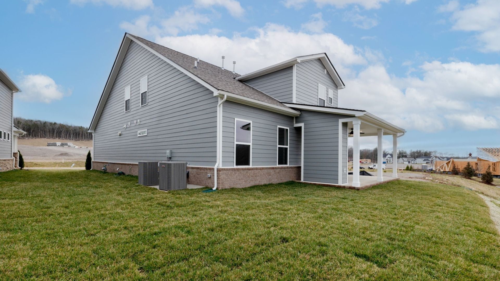 Rear exterior and backyard of home