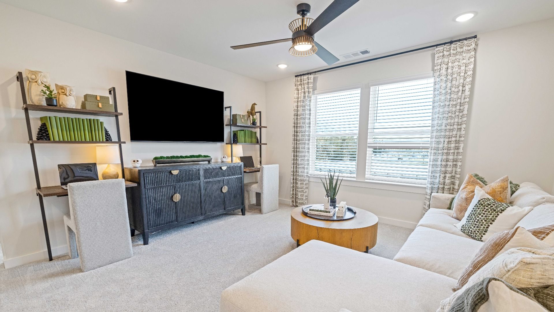 Second Floor Loft area with full living room sofa and TV setup