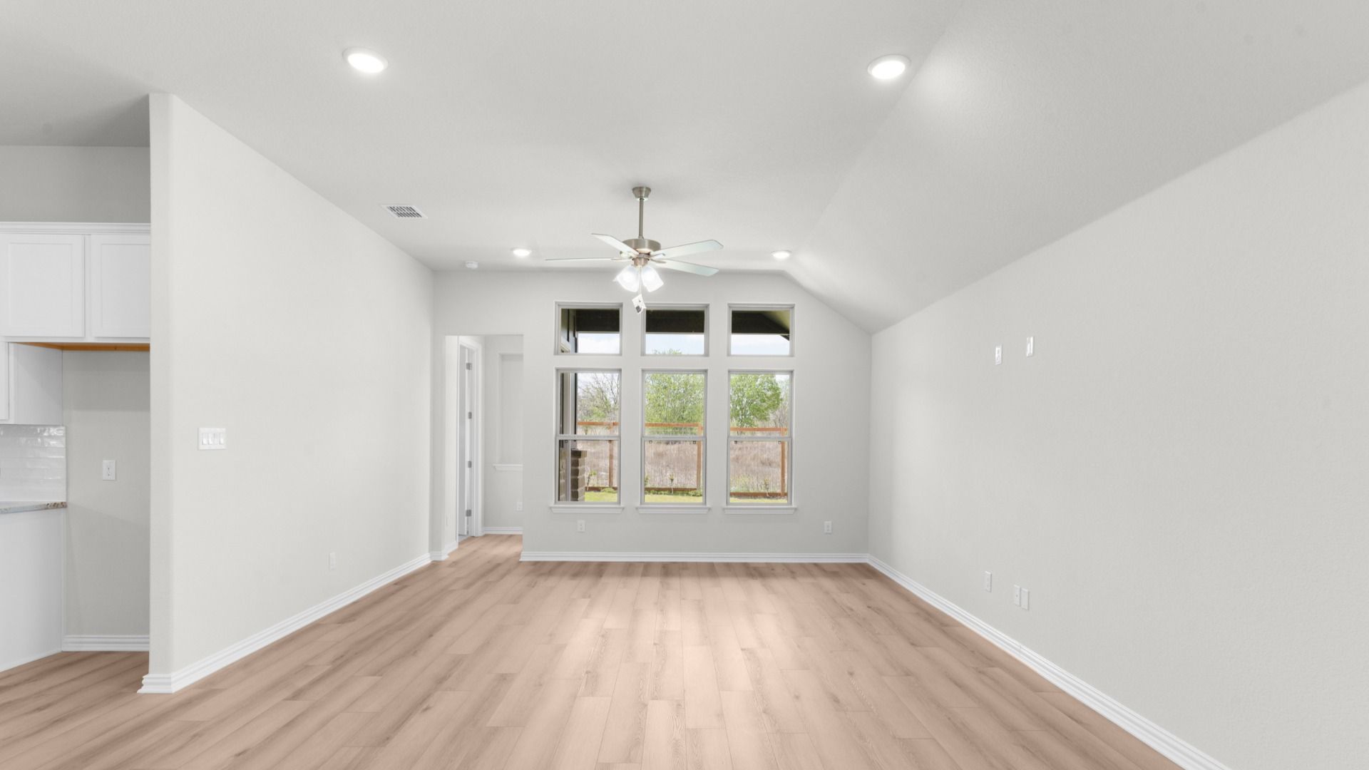 Spacious living/dining combo with seamless flow and natural light