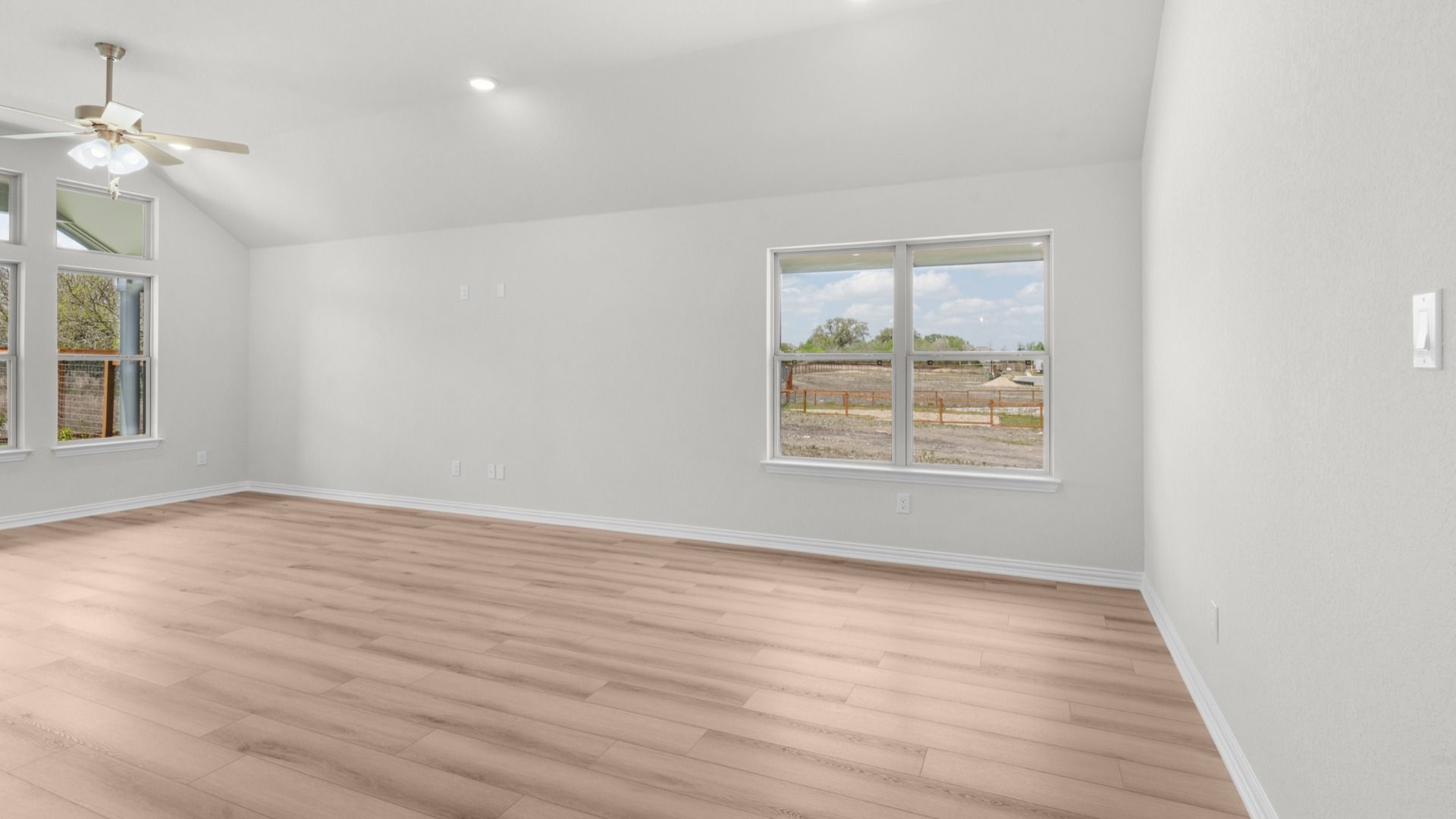 Spacious living/dining combo with seamless flow and natural light