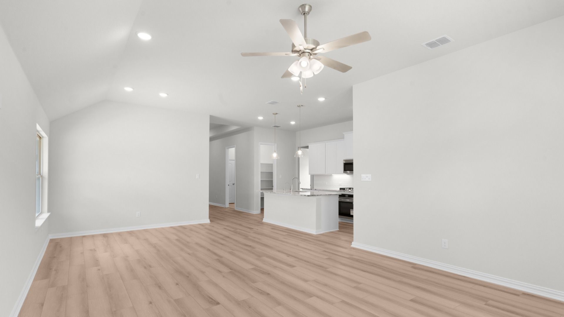 Spacious living/dining combo with seamless flow and natural light