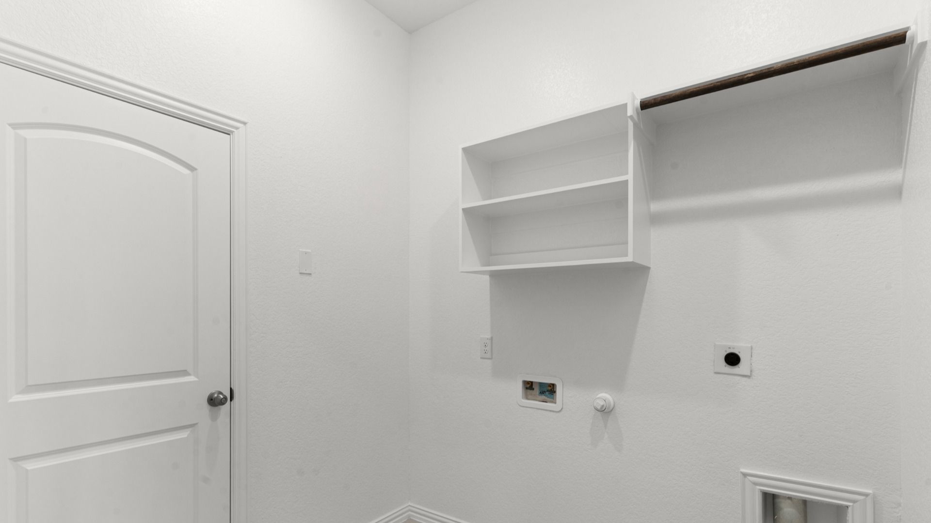 Laundry Room with Built In Shelving & Hanging Rod