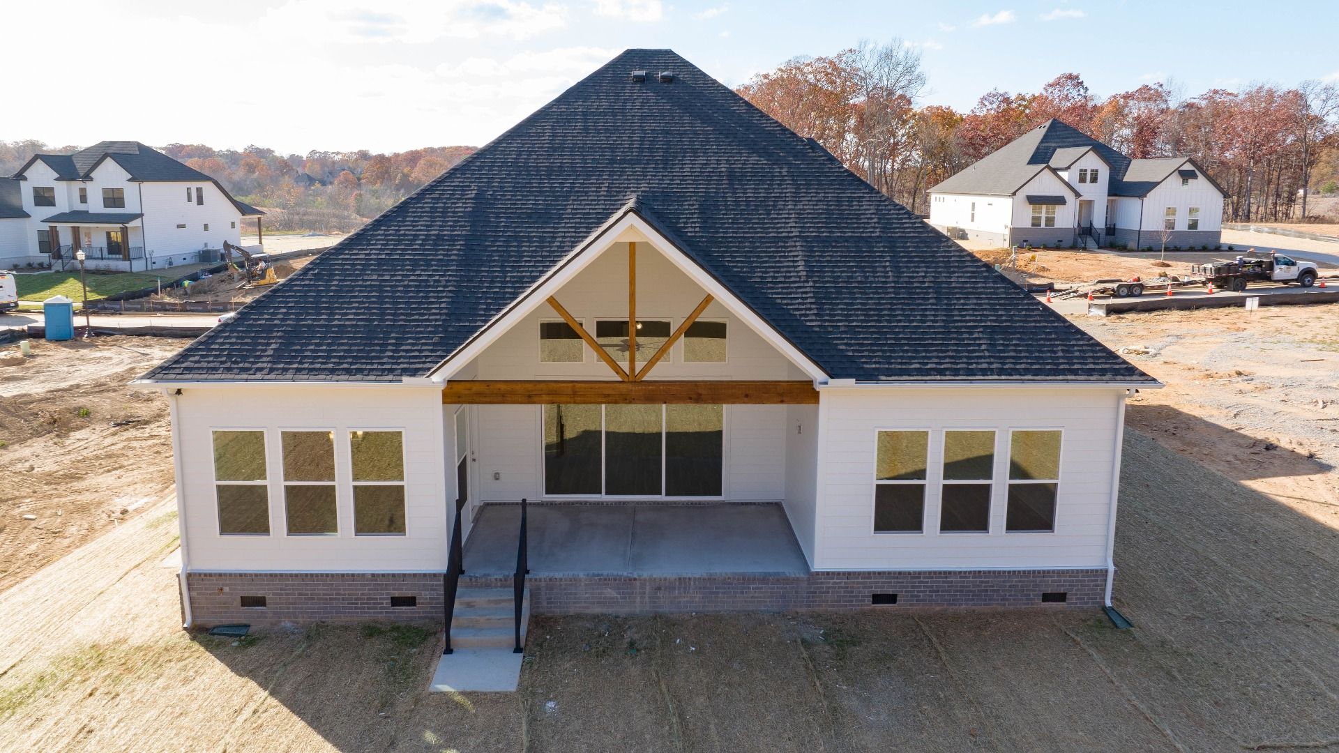 Rear of home with covered back patio