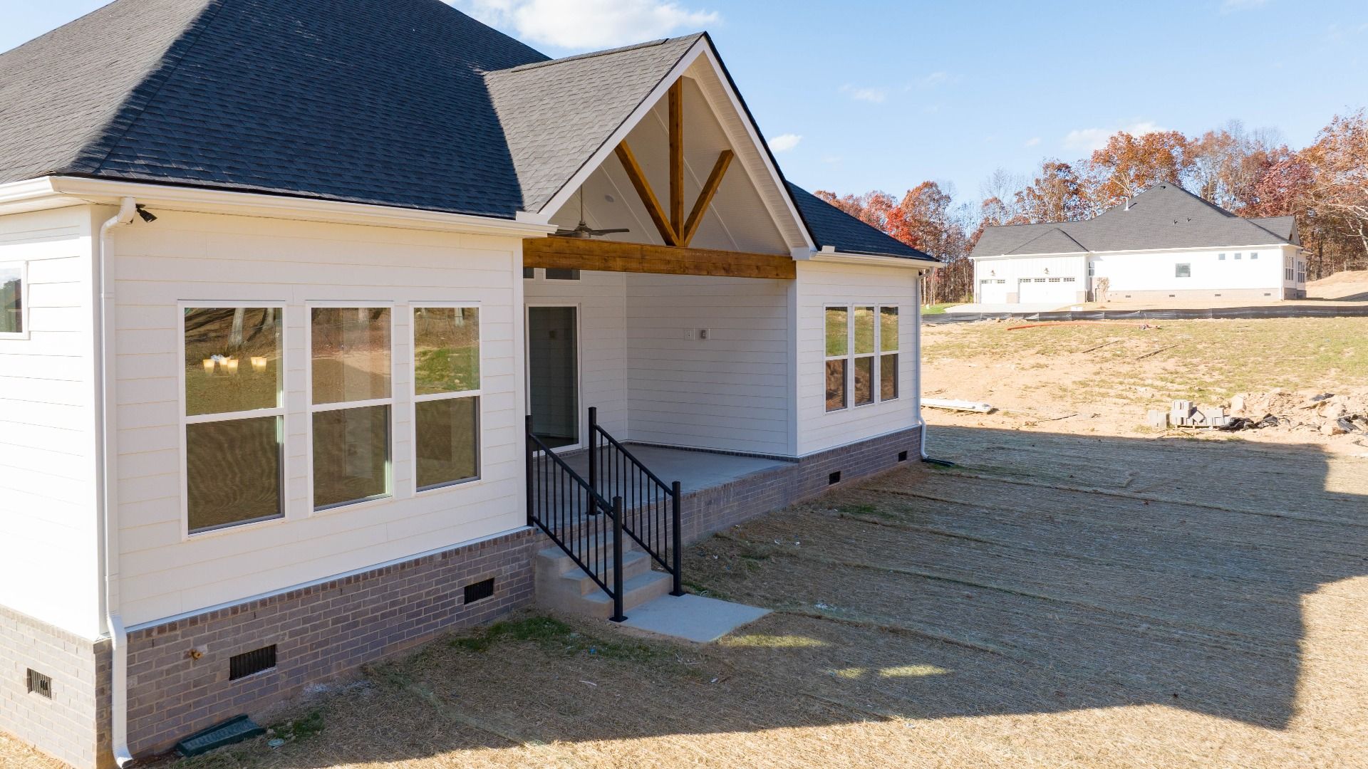 Rear of home with covered back patio