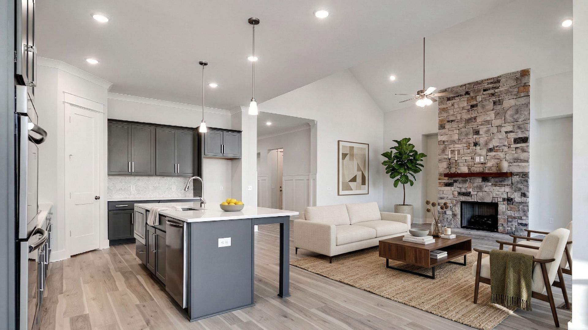 Virtually staged living room with stone fireplace near kitchen