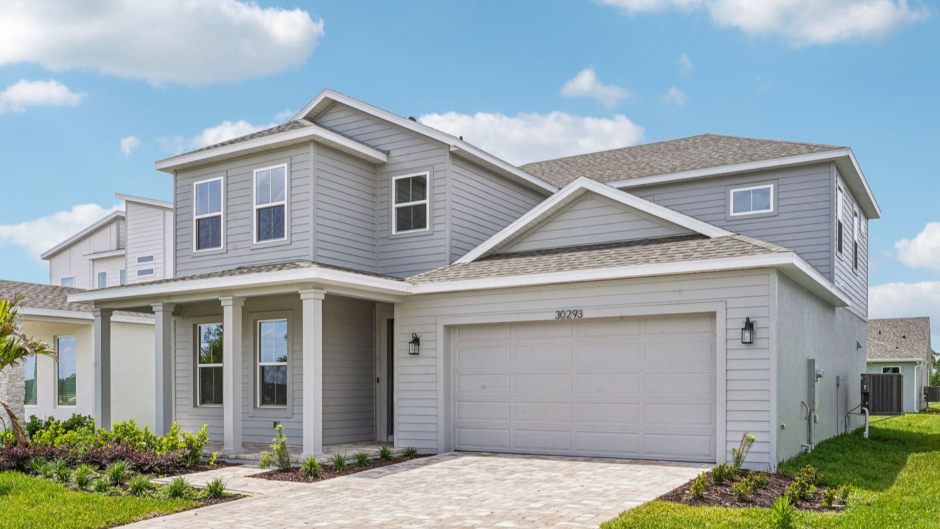 Plumeria Floor Plan Front Exterior Elevation by DRB Homes in Trailside located in Mount Dora, FL