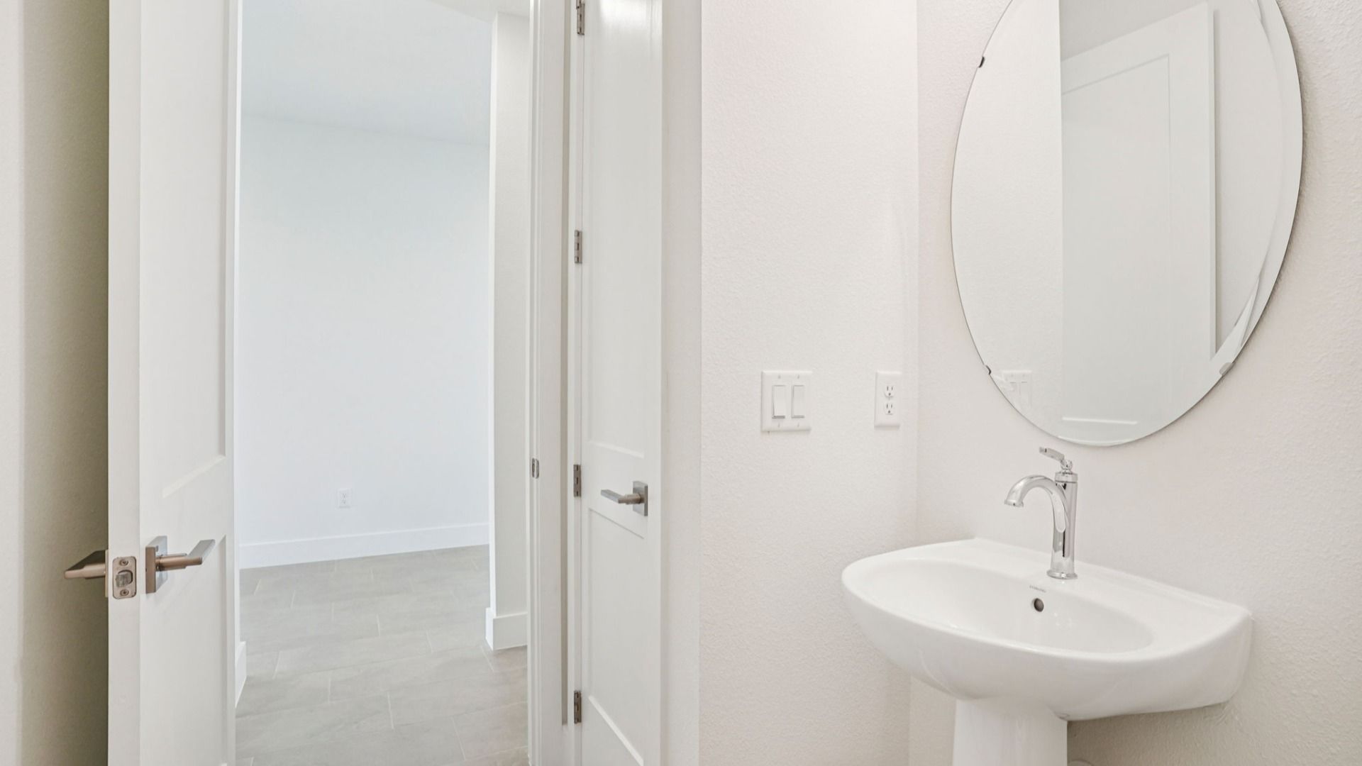 Plumeria Floor Plan first floor half bathroom with a linen closet by DRB Homes in Trailside located in Mount Dora, FL