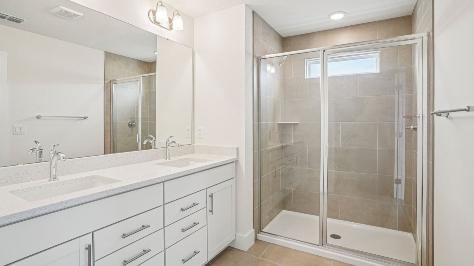Plumeria Floor Plan primary suite bathroom with dual sinks by DRB Homes in Trailside located in Mount Dora, FL