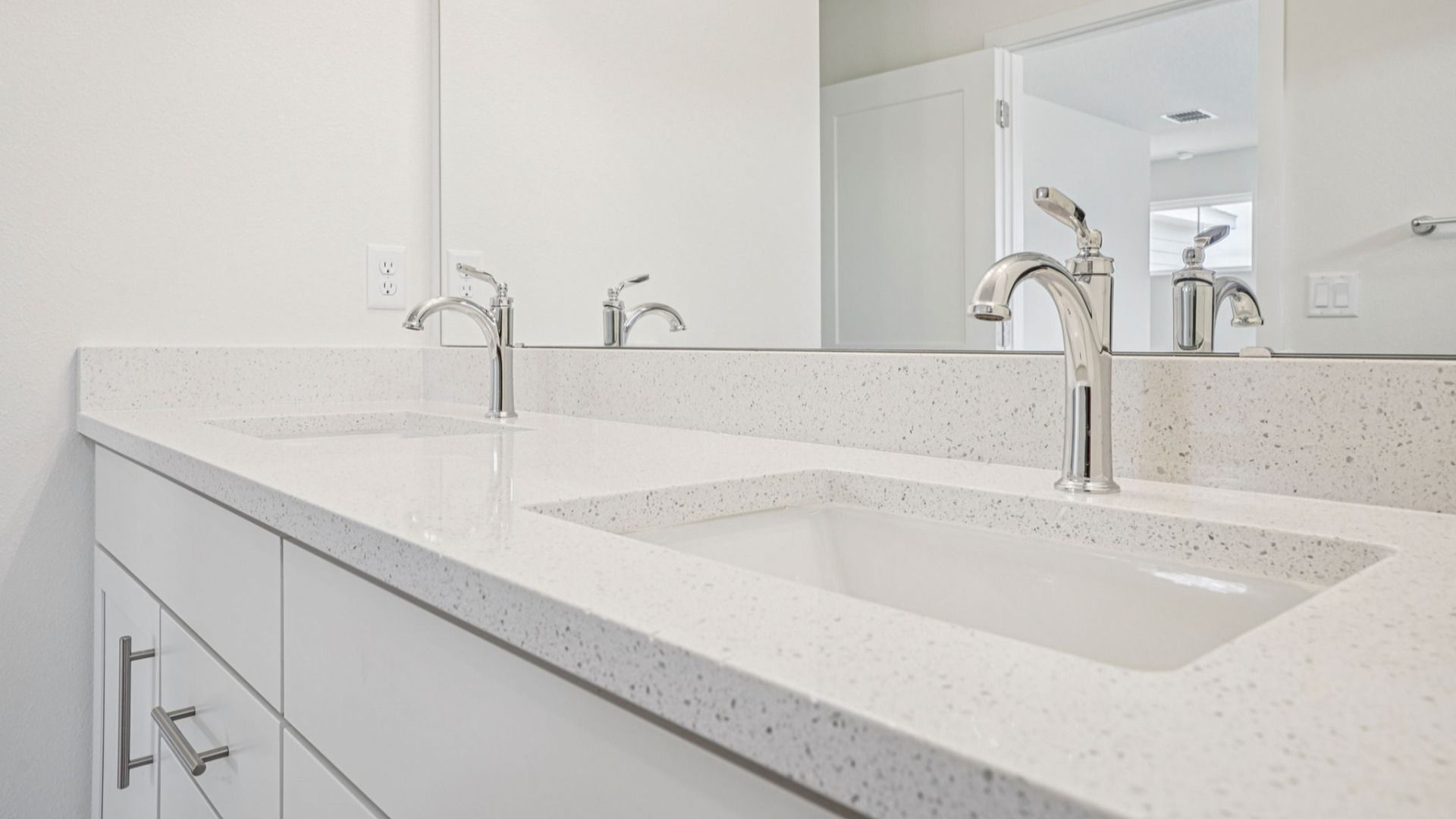 Plumeria Floor Plan primary suite bathroom with dual sinks by DRB Homes in Trailside located in Mount Dora, FL
