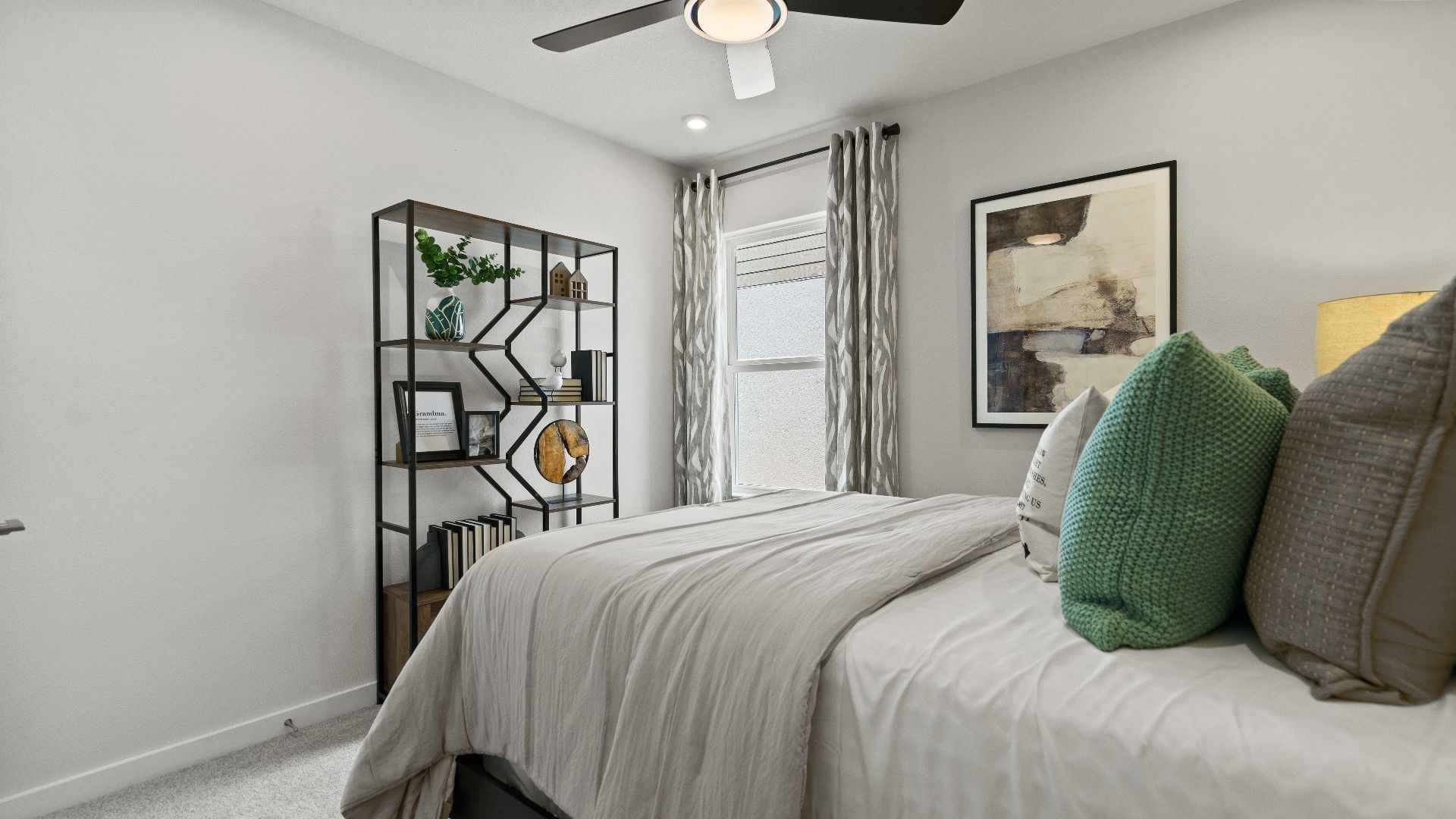 Atlantic Plan Single Story Home by DRB Homes, Third Bedroom Staged as a guest room in Haines City FL.