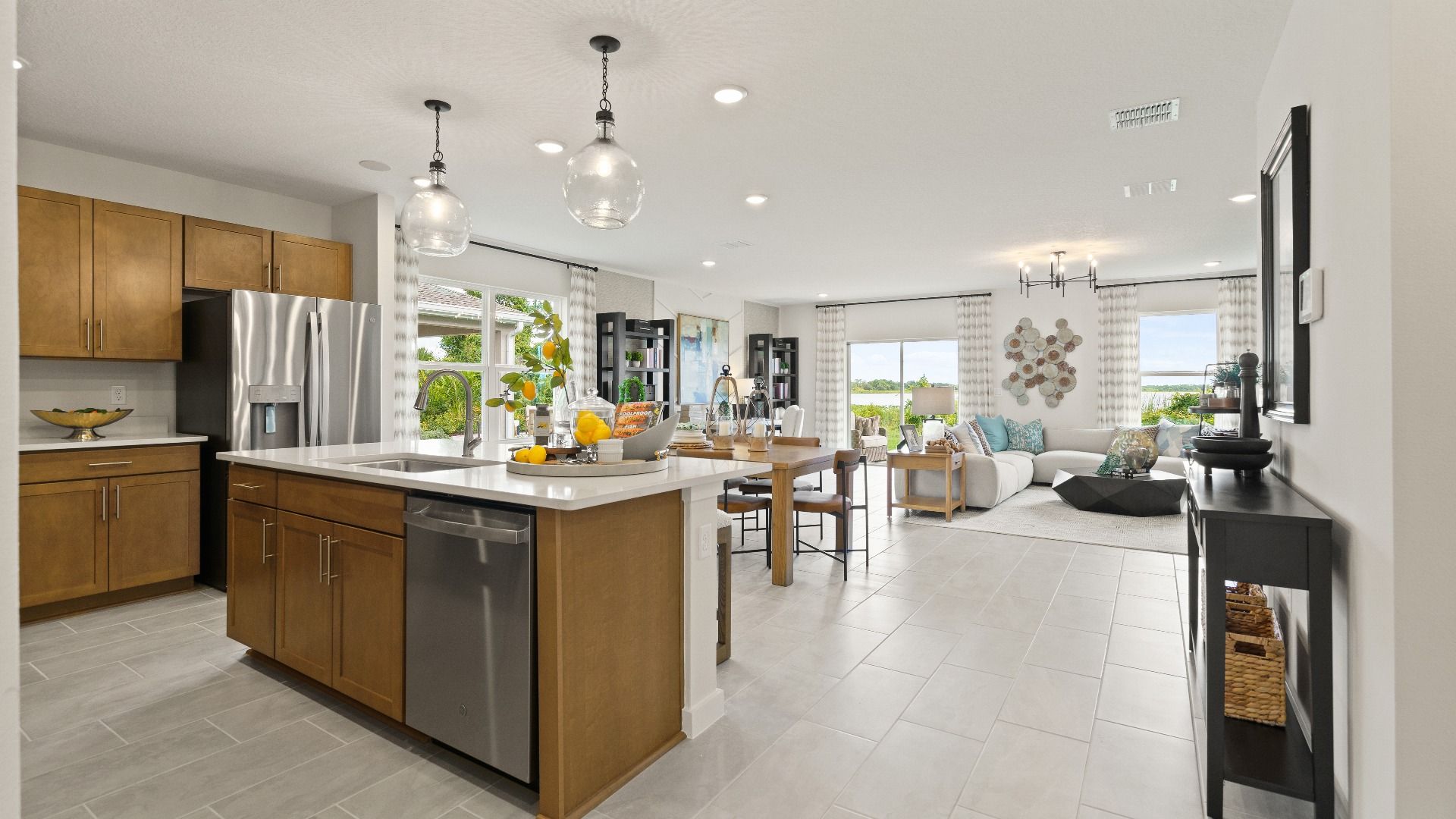 Castaway Model open concept living area and kitchen, new home plan available at Liberty Trace in Haines City, fl